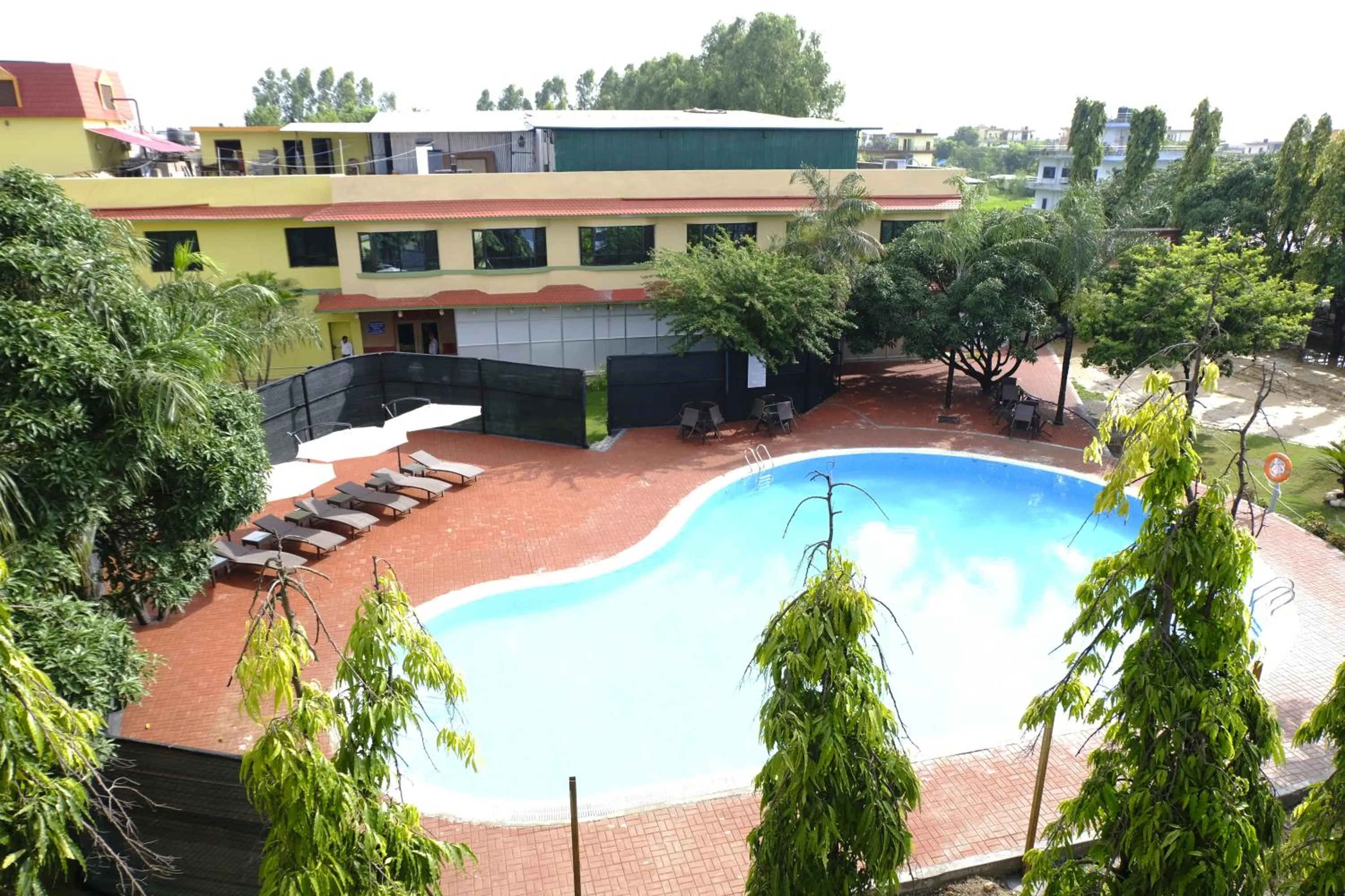 Swimming pool in Hotel Nirvana by Luxury International