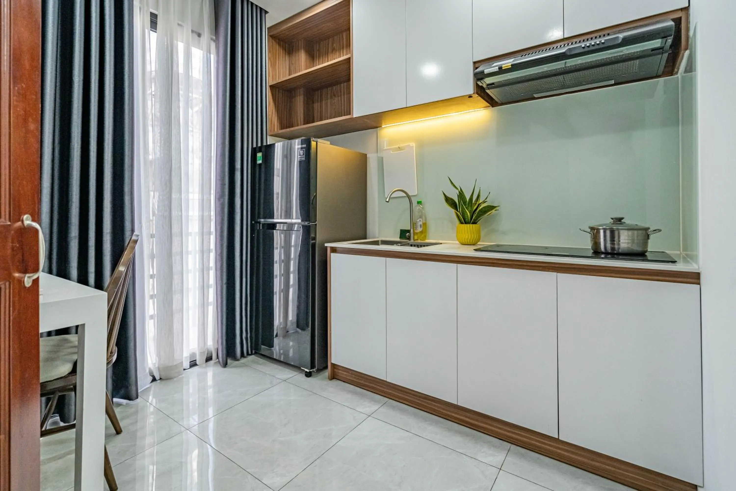 Kitchen or kitchenette in Spring Hill Apartment -The High Class