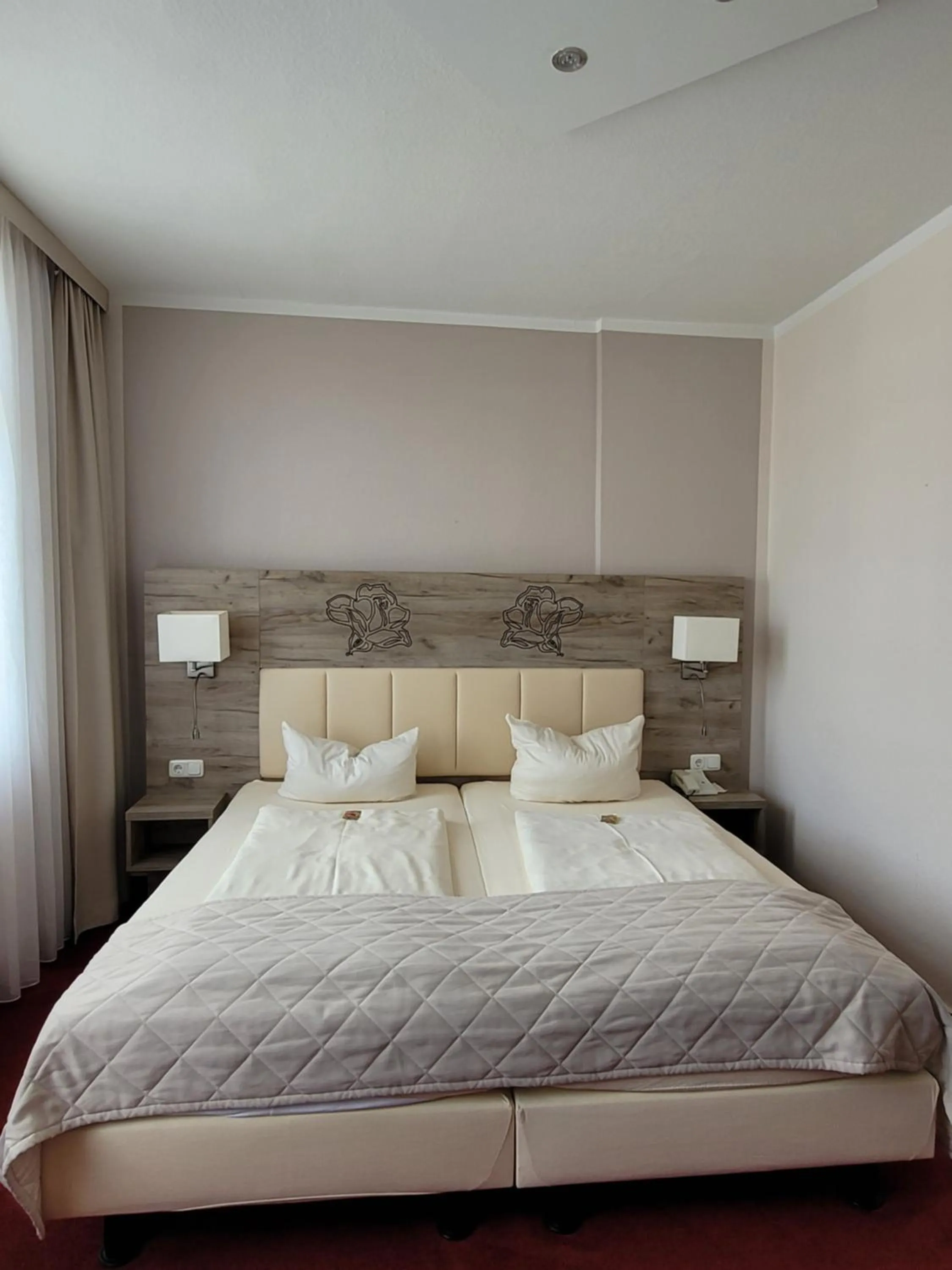 Bed in Hotel Rosengarten