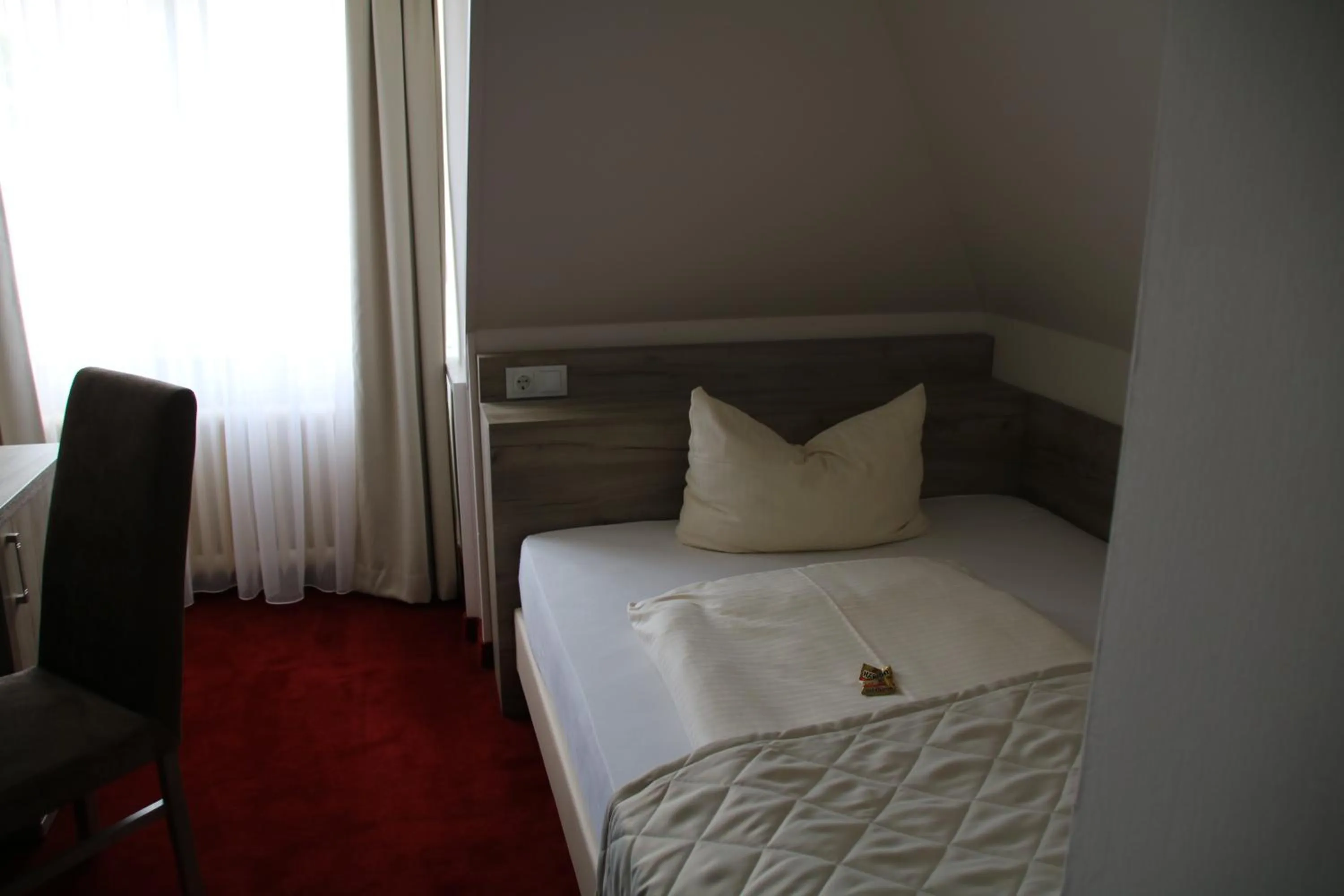 Photo of the whole room, Bed in Hotel Rosengarten
