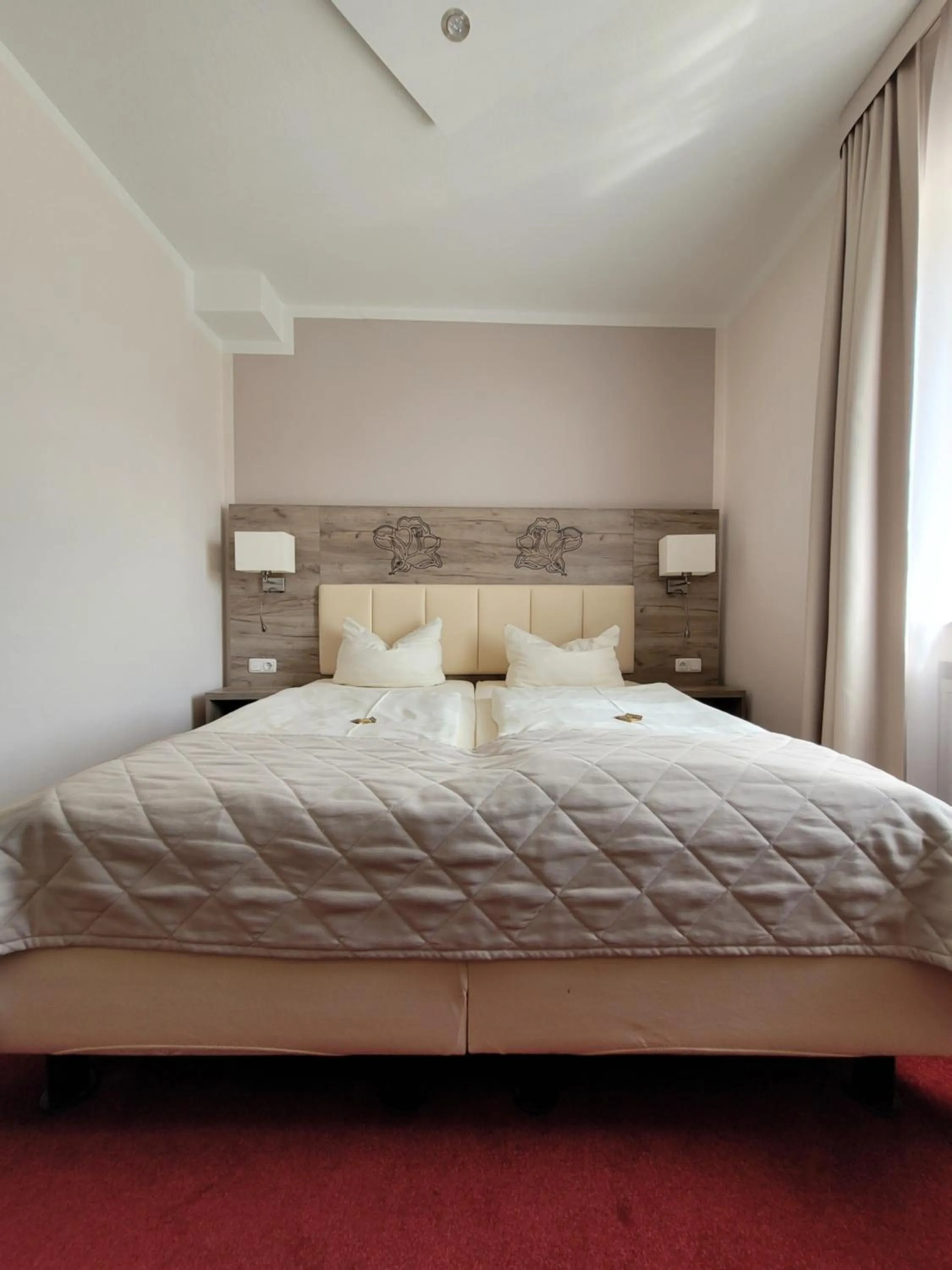 Bed in Hotel Rosengarten