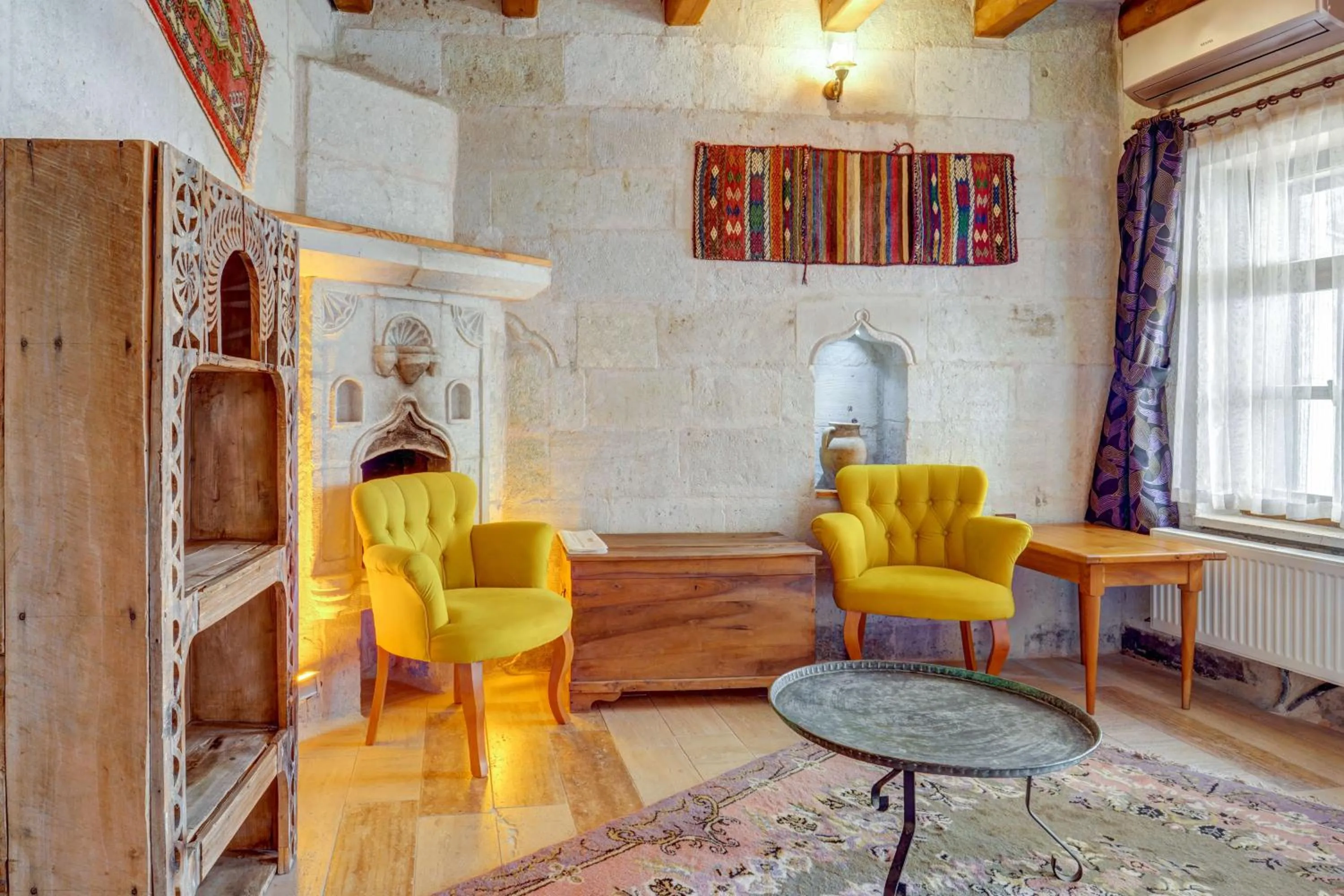 Seating area in Avilla Cave Hotel