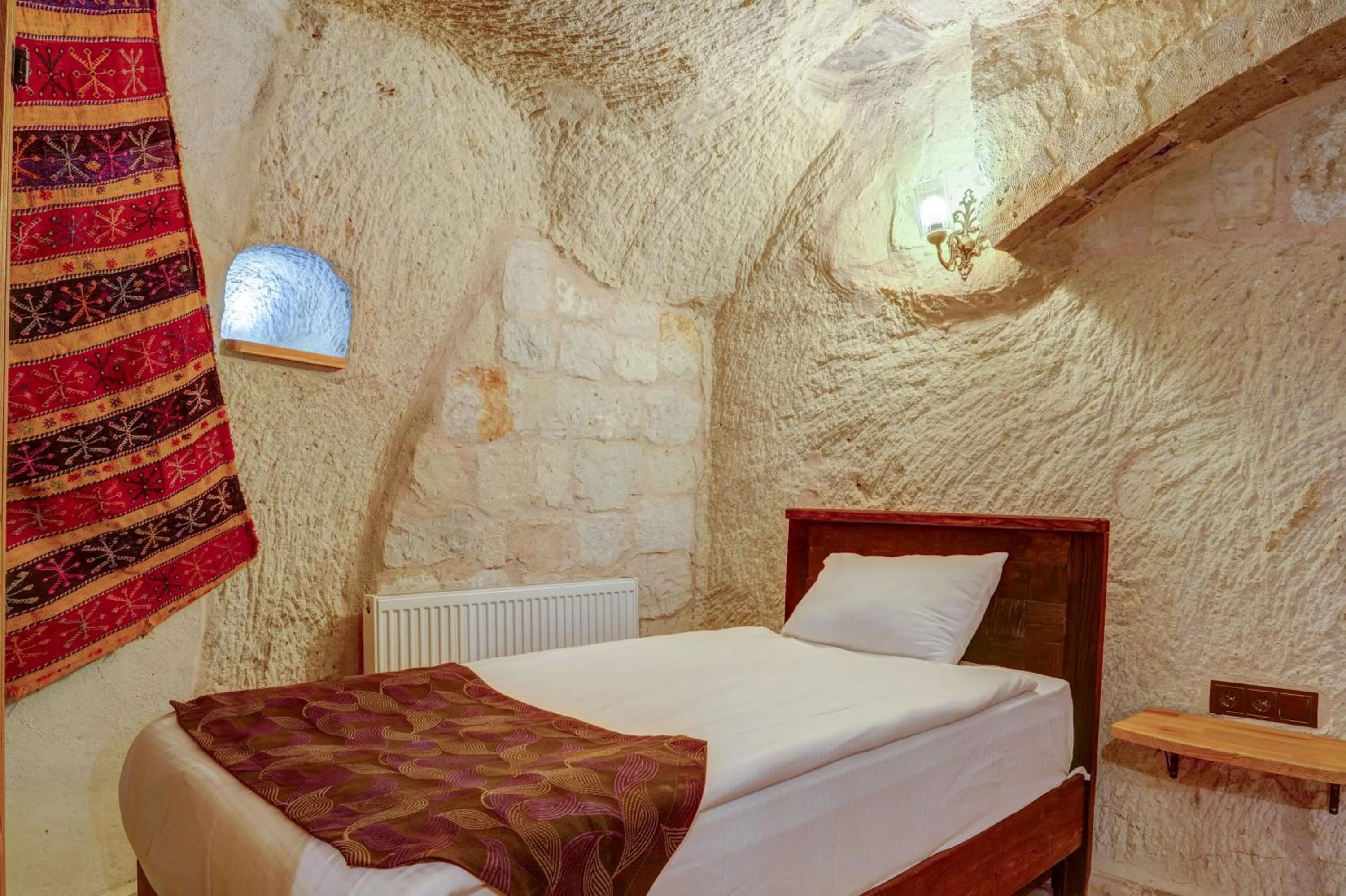 Bed in Avilla Cave Hotel