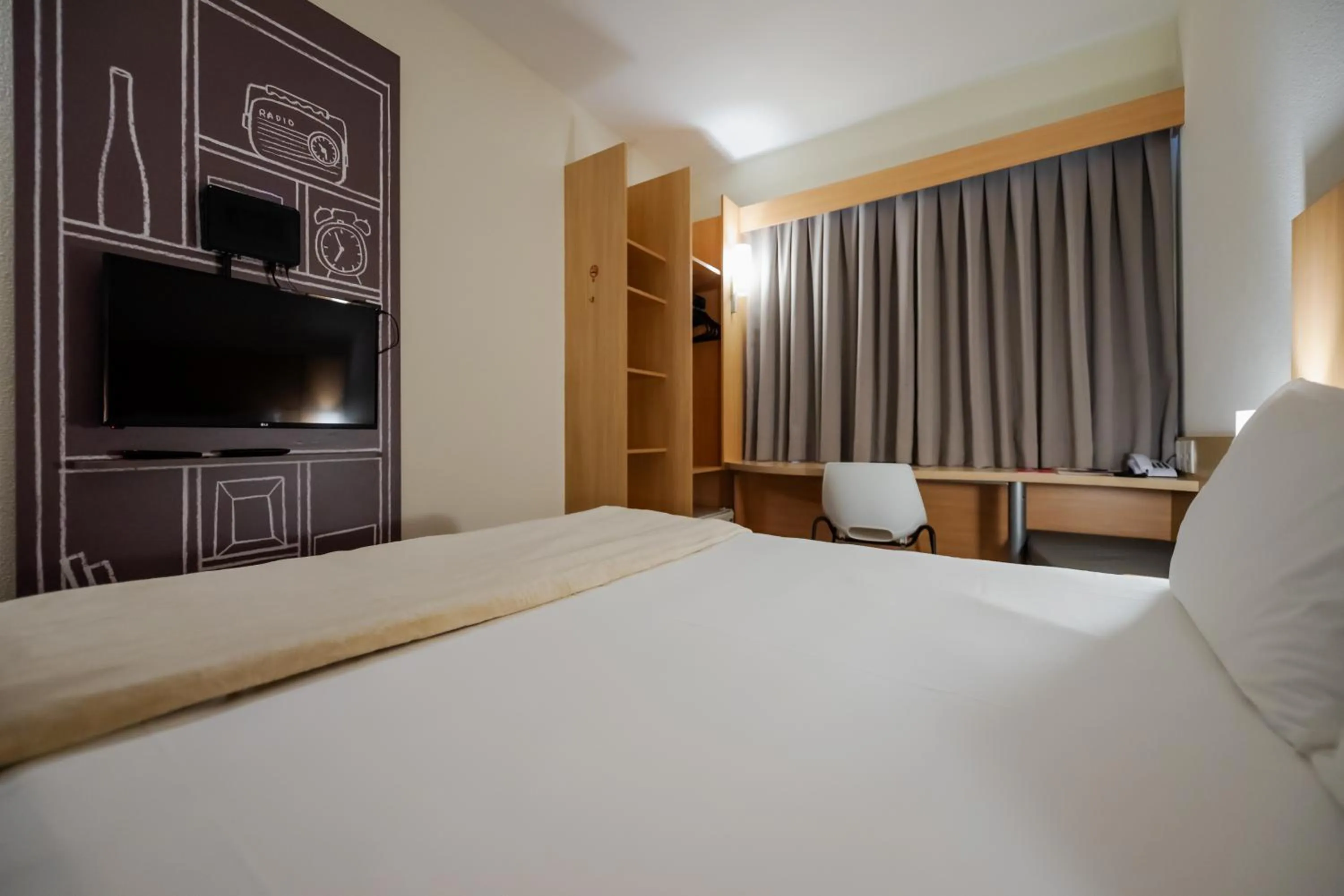 Bed in Ibis Florianopolis