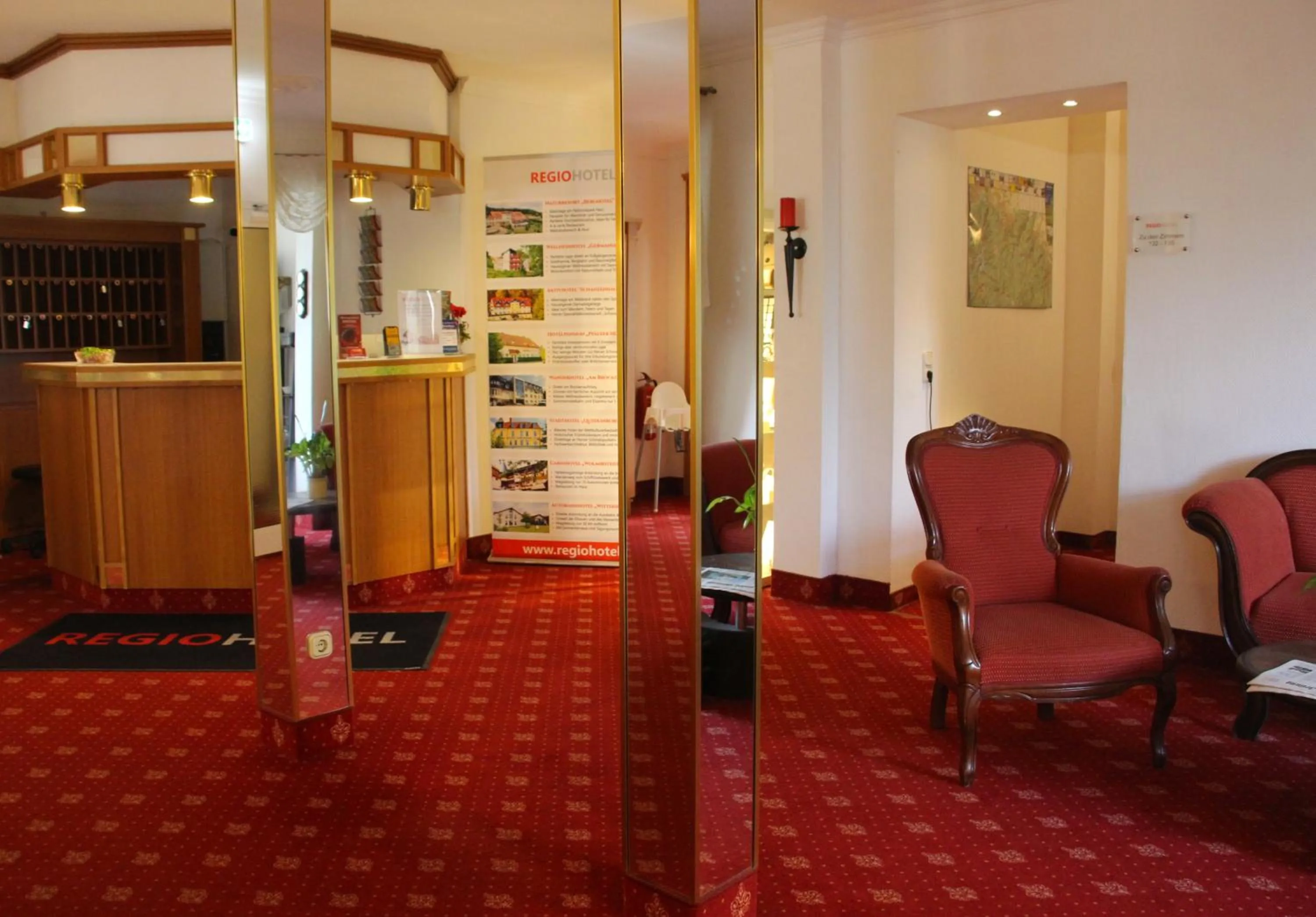 Lobby or reception in REGIOHOTEL Germania Bad Harzburg - #DirektAmKurpark #Wellnessbereich #Frühstücksbuffet #FreeParking
