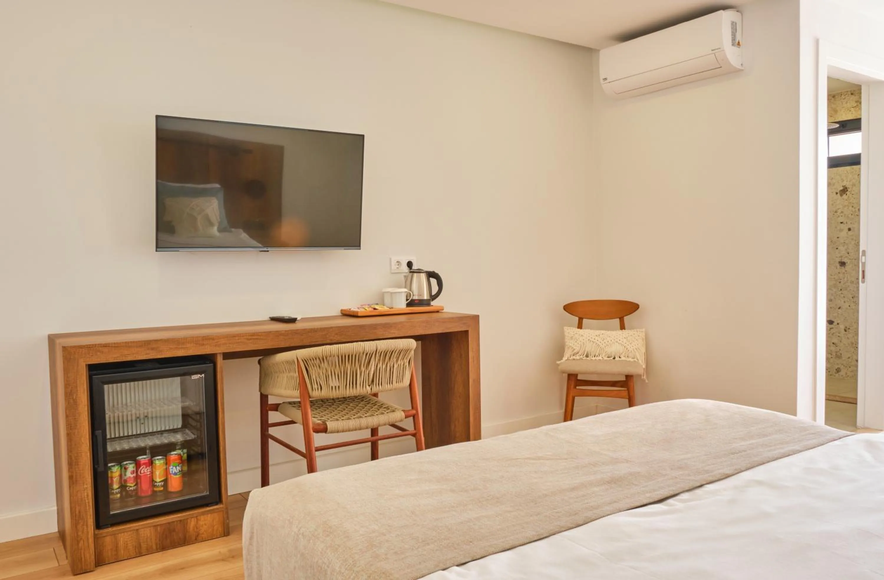 Bed, TV/Entertainment Center in niXie Hotel & Beach - Adult Only