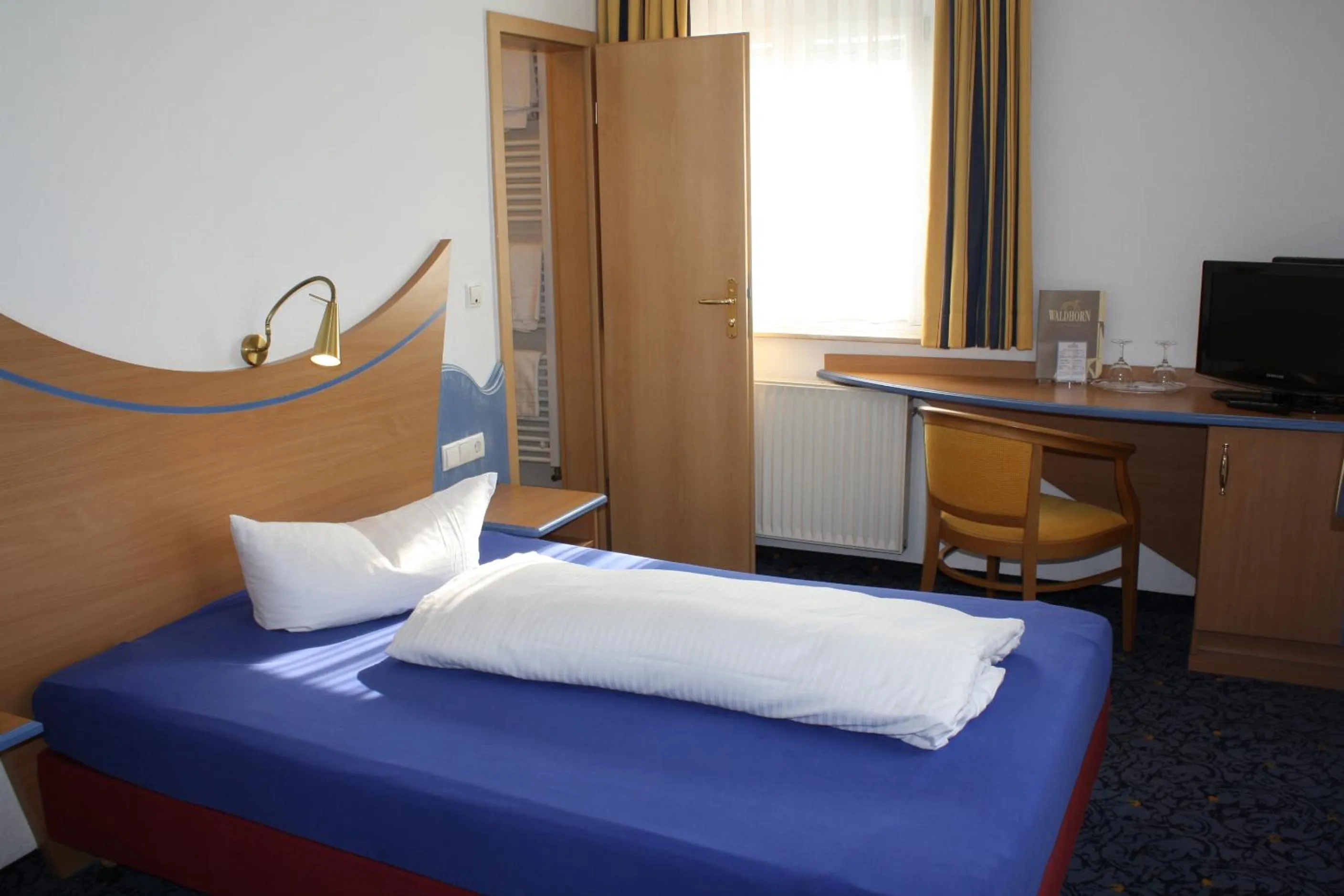 Photo of the whole room, Bed in Hotel Waldhorn