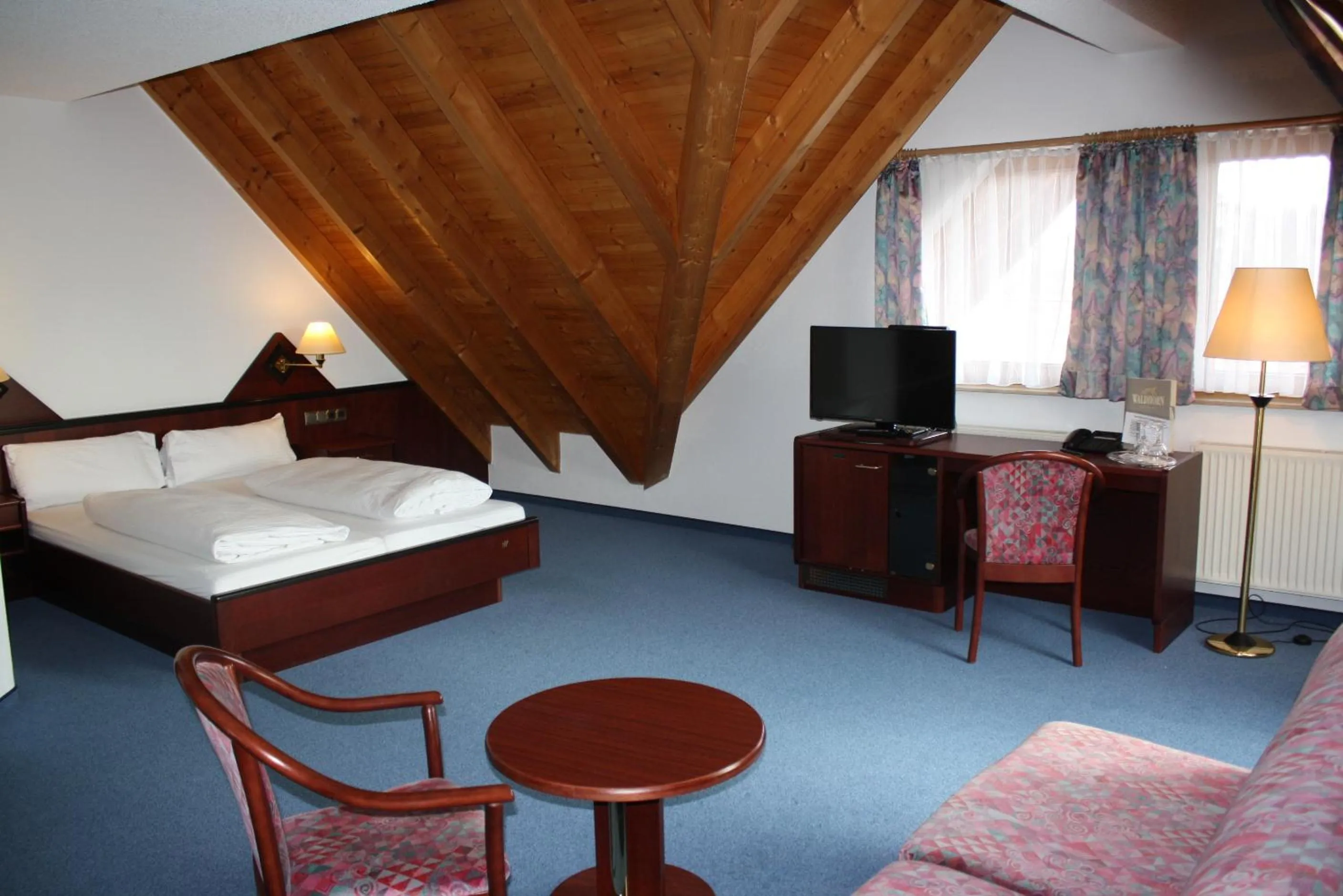 Photo of the whole room, Bed in Hotel Waldhorn