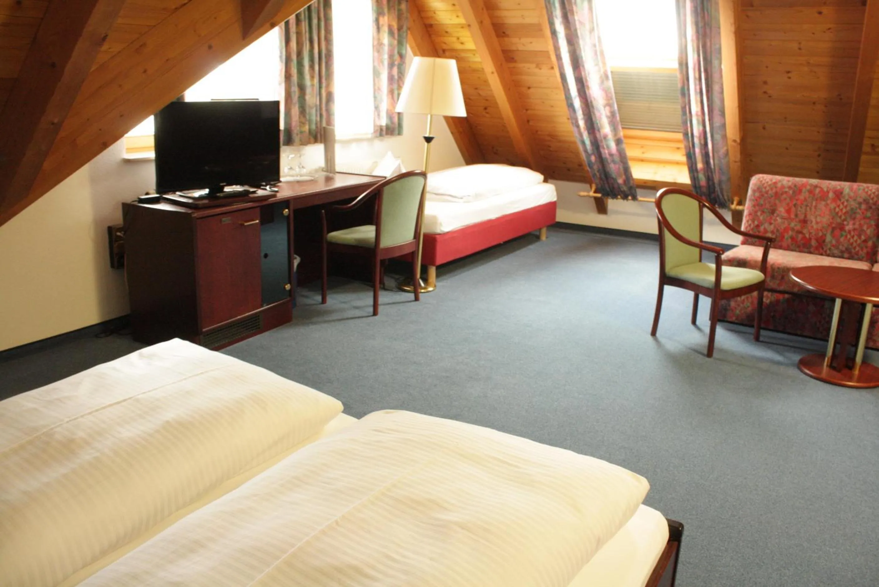 Photo of the whole room, Bed in Hotel Waldhorn