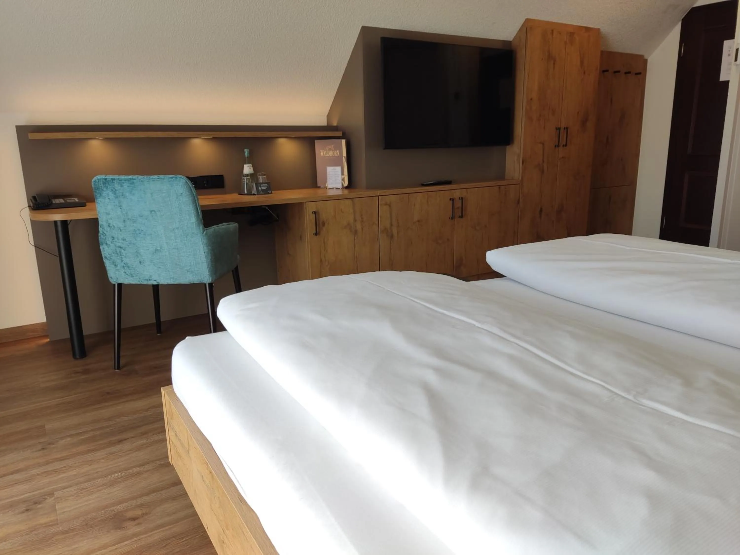 Photo of the whole room, Bed in Hotel Waldhorn