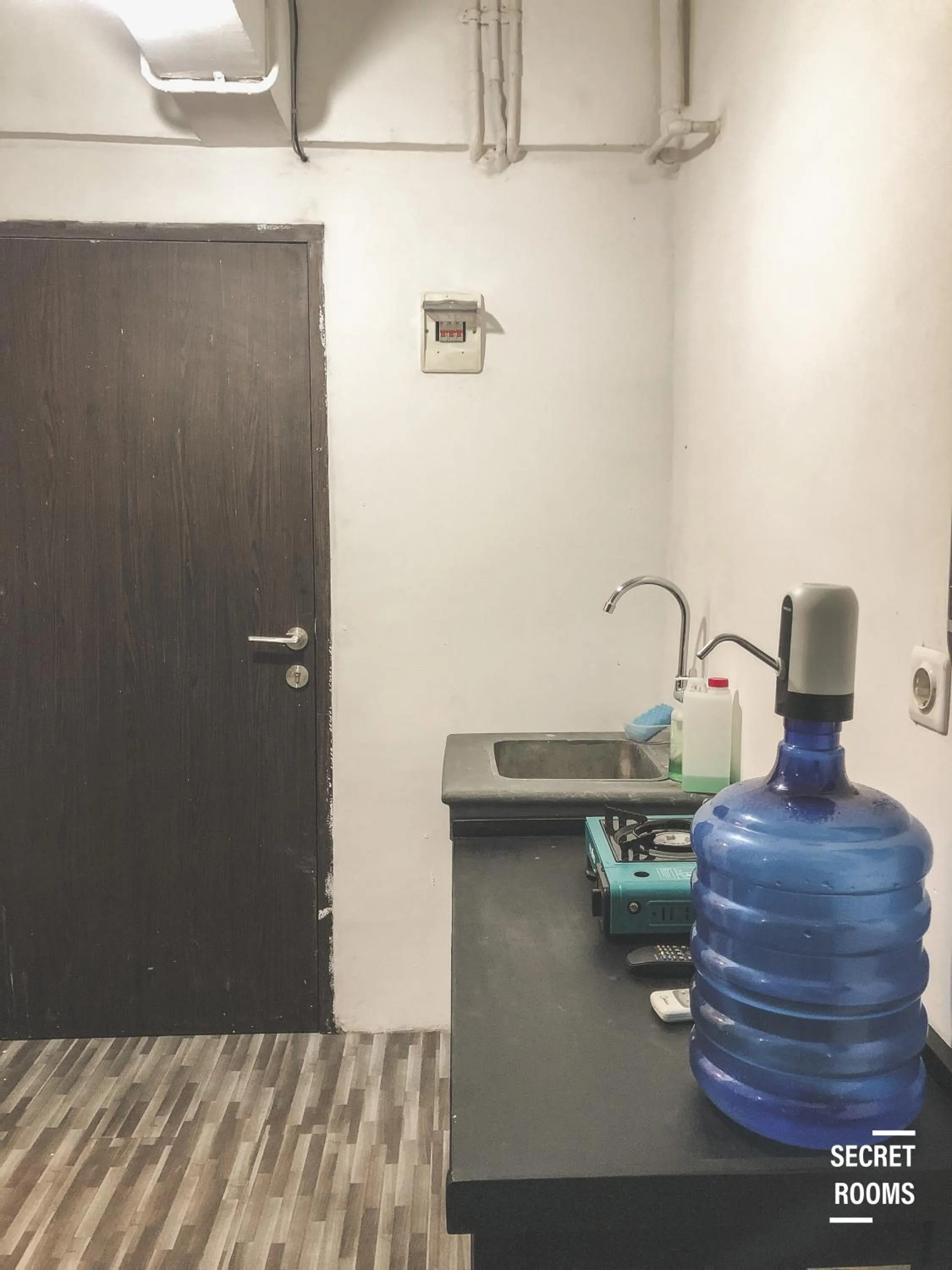 Kitchen or kitchenette in The Jarrdin Apartement by Secret Rooms