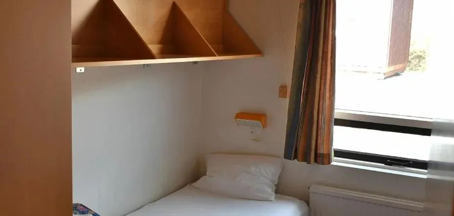 Bed in Kaffi Holar Cottages and Apartments
