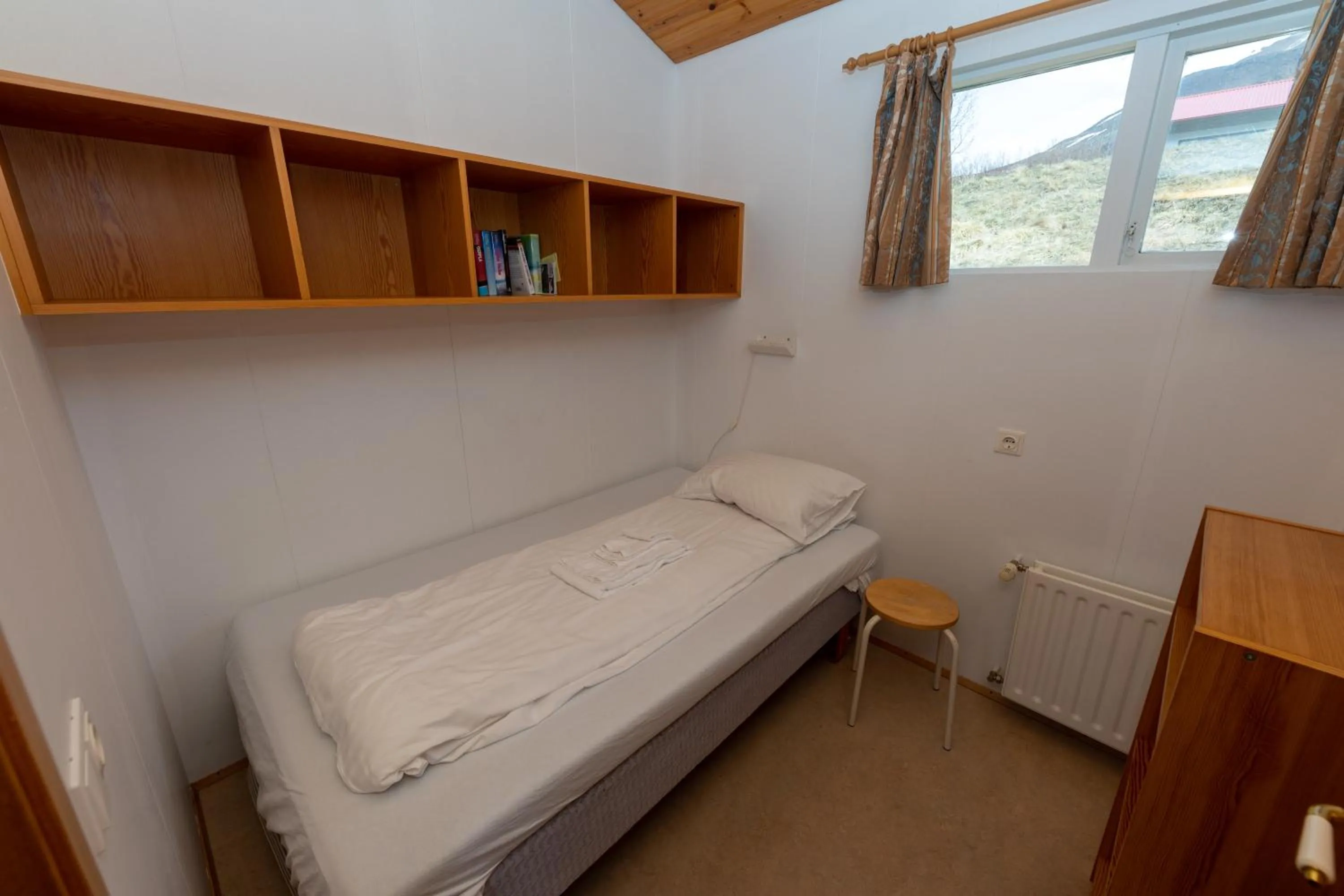 Bed in Kaffi Holar Cottages and Apartments