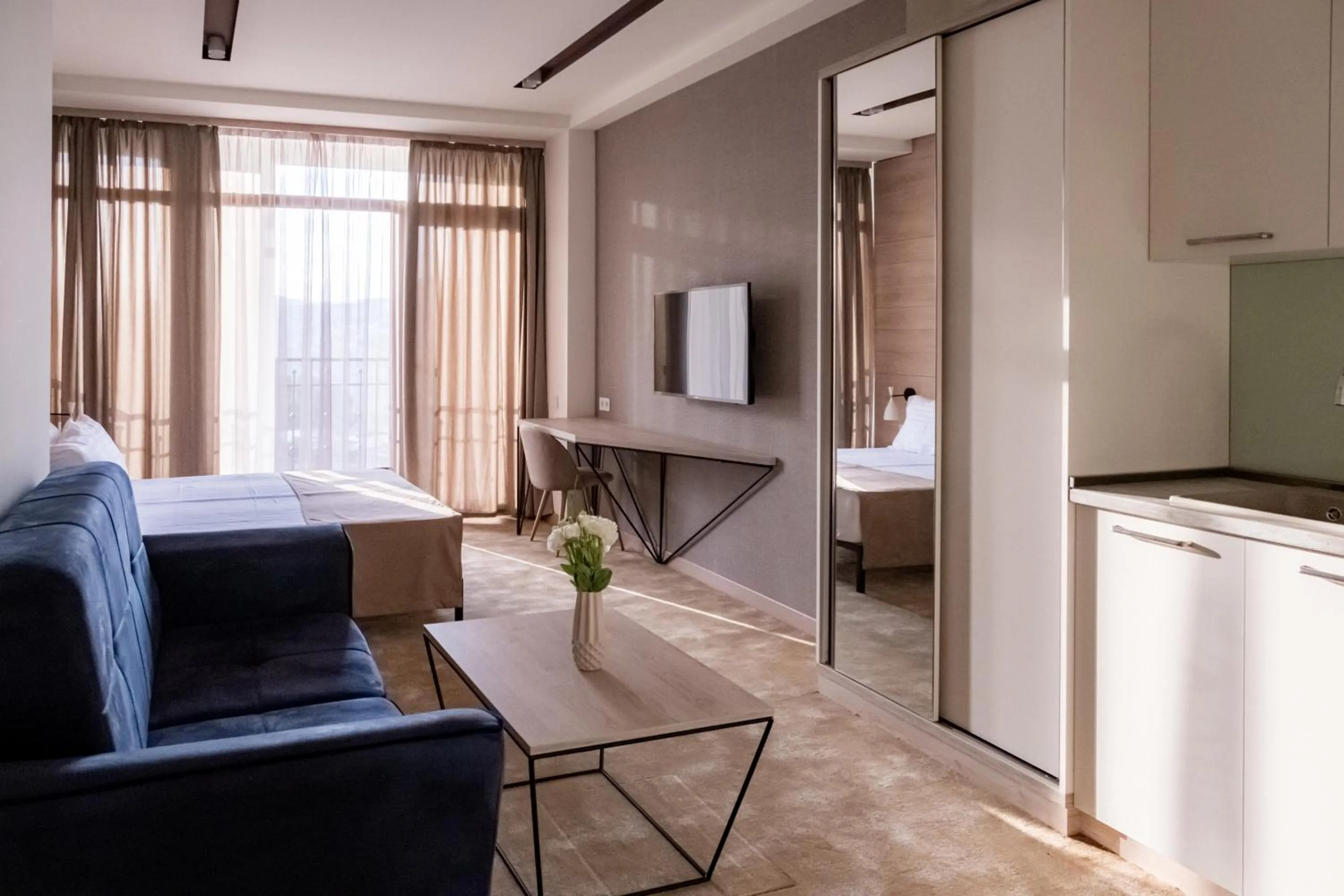 Living room, Bed in Rooftop Apart-Hotel