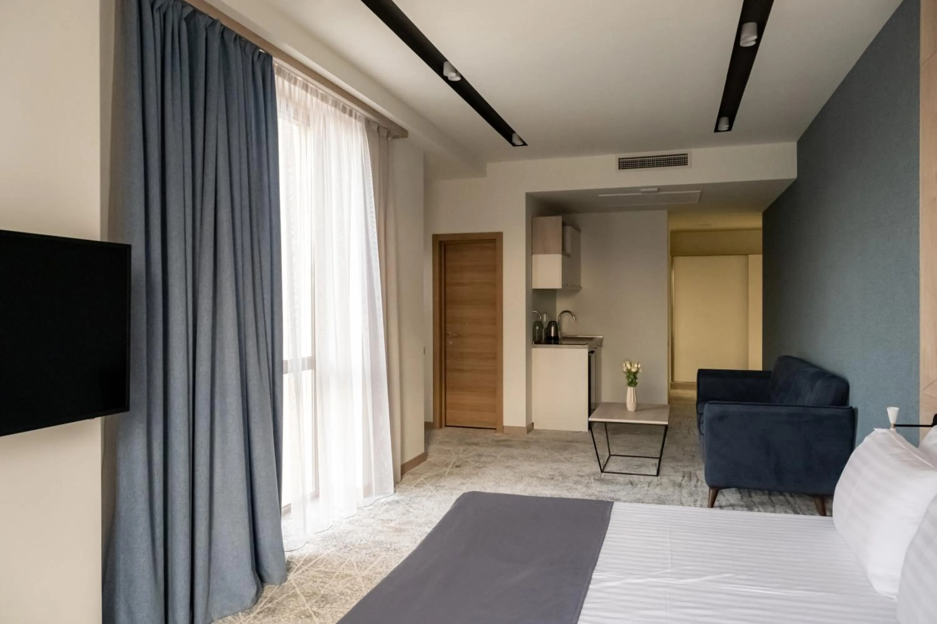 Photo of the whole room, Bed in Rooftop Apart-Hotel