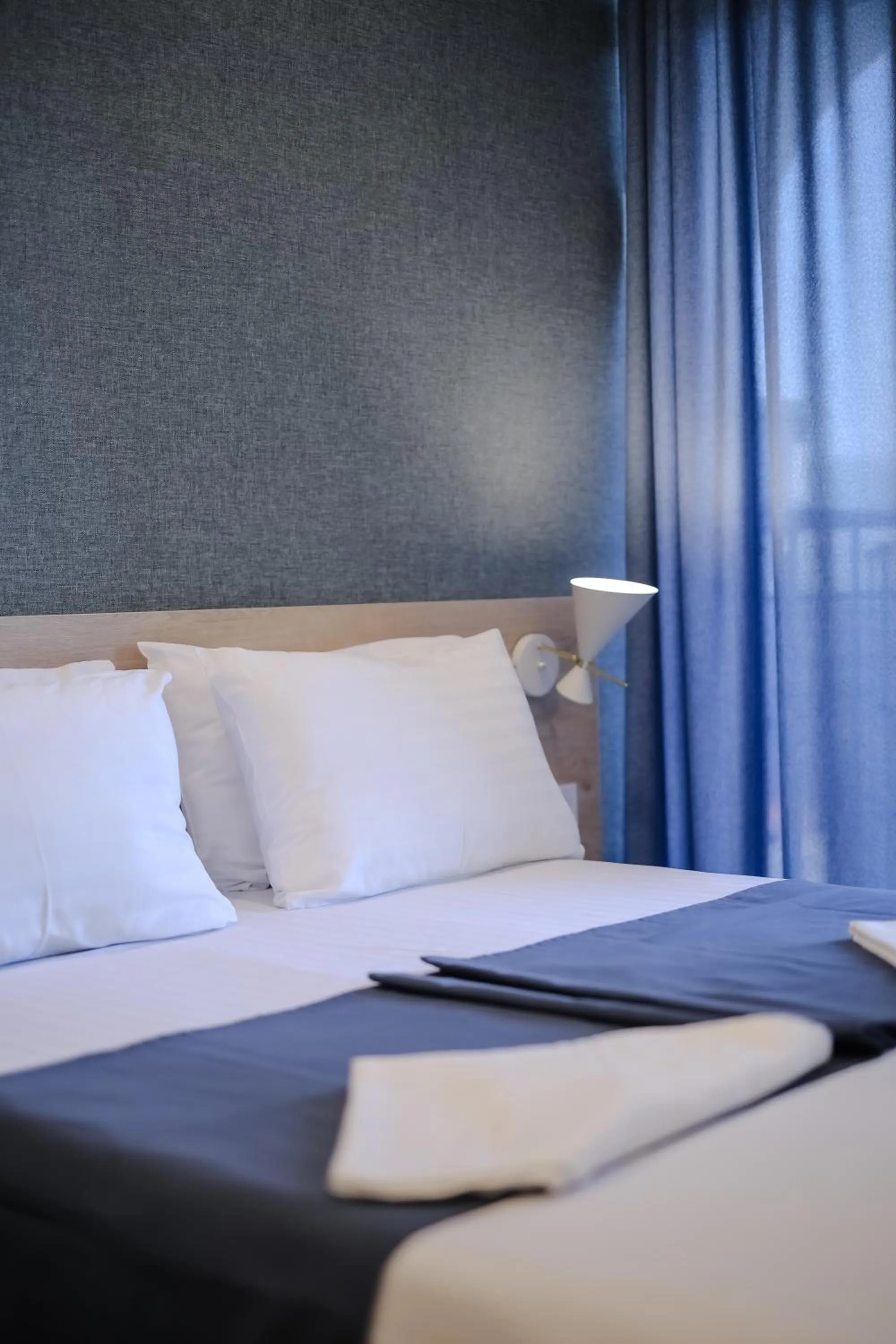 Bed in Rooftop Apart-Hotel