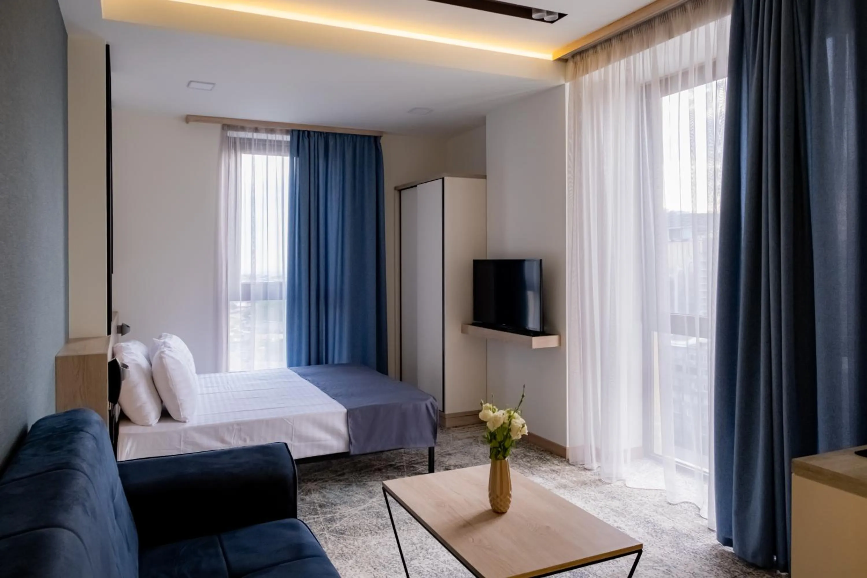 Photo of the whole room, Bed in Rooftop Apart-Hotel