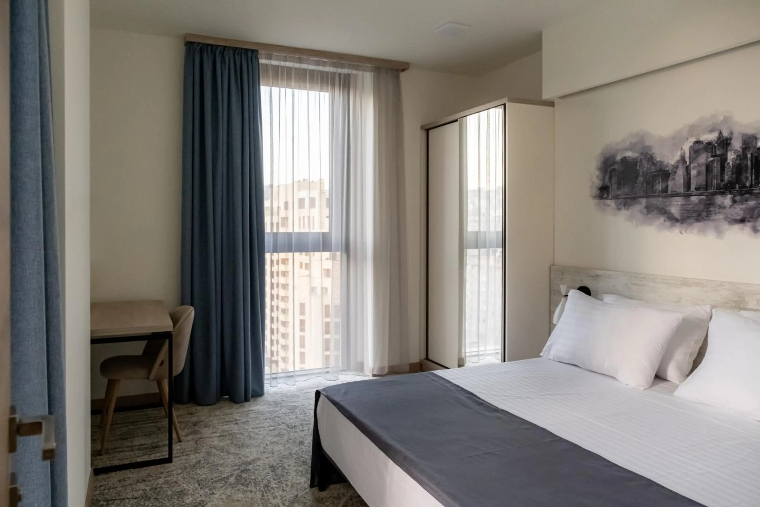 Bed in Rooftop Apart-Hotel