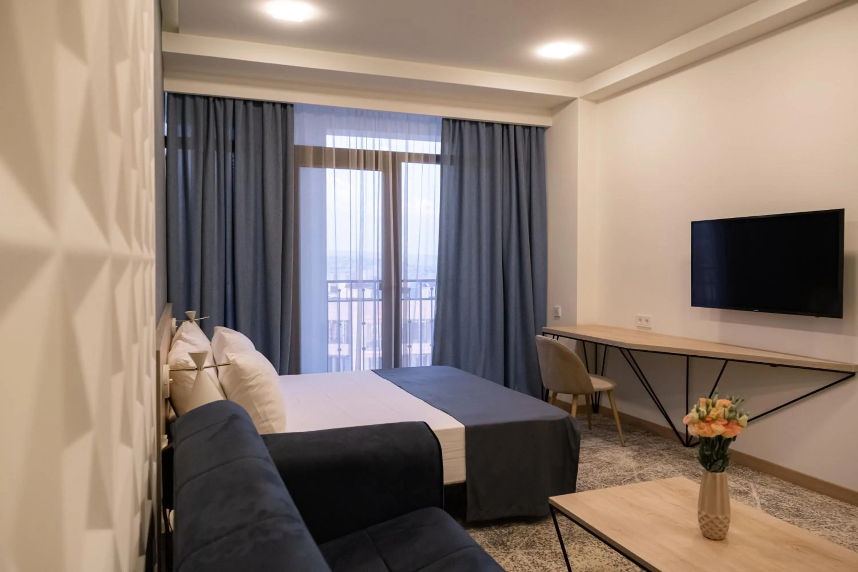 Photo of the whole room, Bed in Rooftop Apart-Hotel