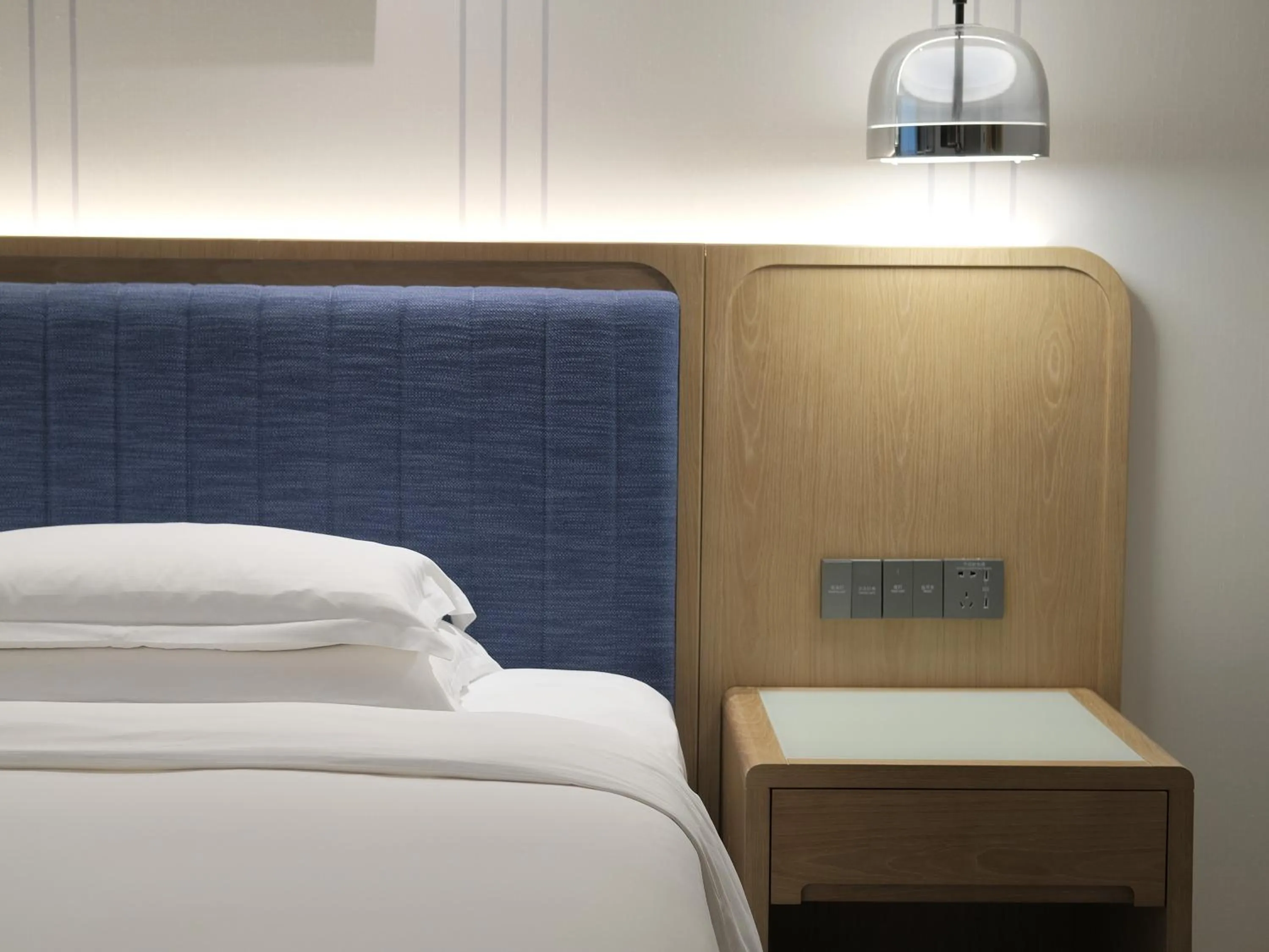 Bed in voco Guangzhou Shifu by IHG