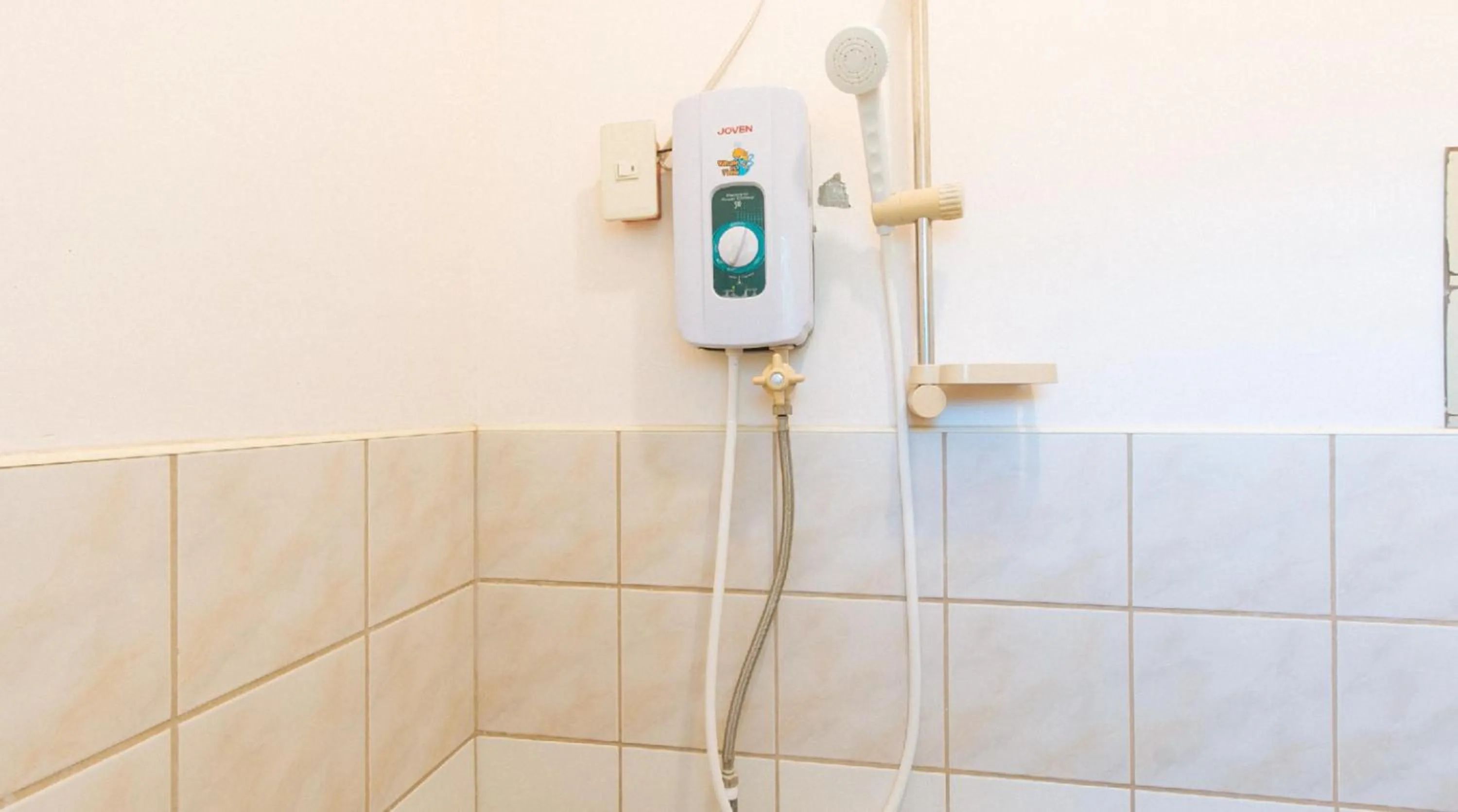 Shower in RedDoorz Hostel at Megans Paradisio Beach Resort