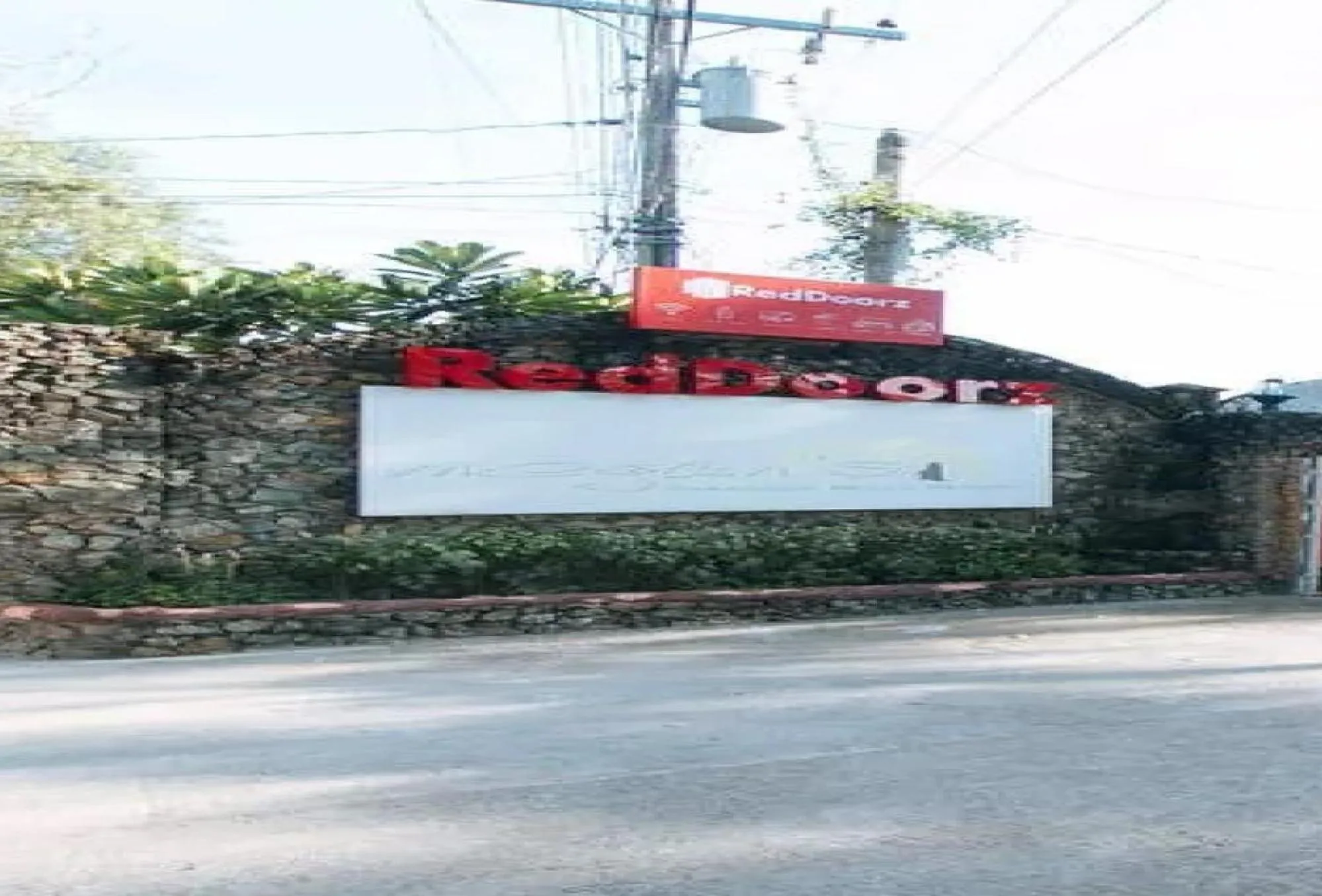 Property building in RedDoorz Hostel at Megans Paradisio Beach Resort