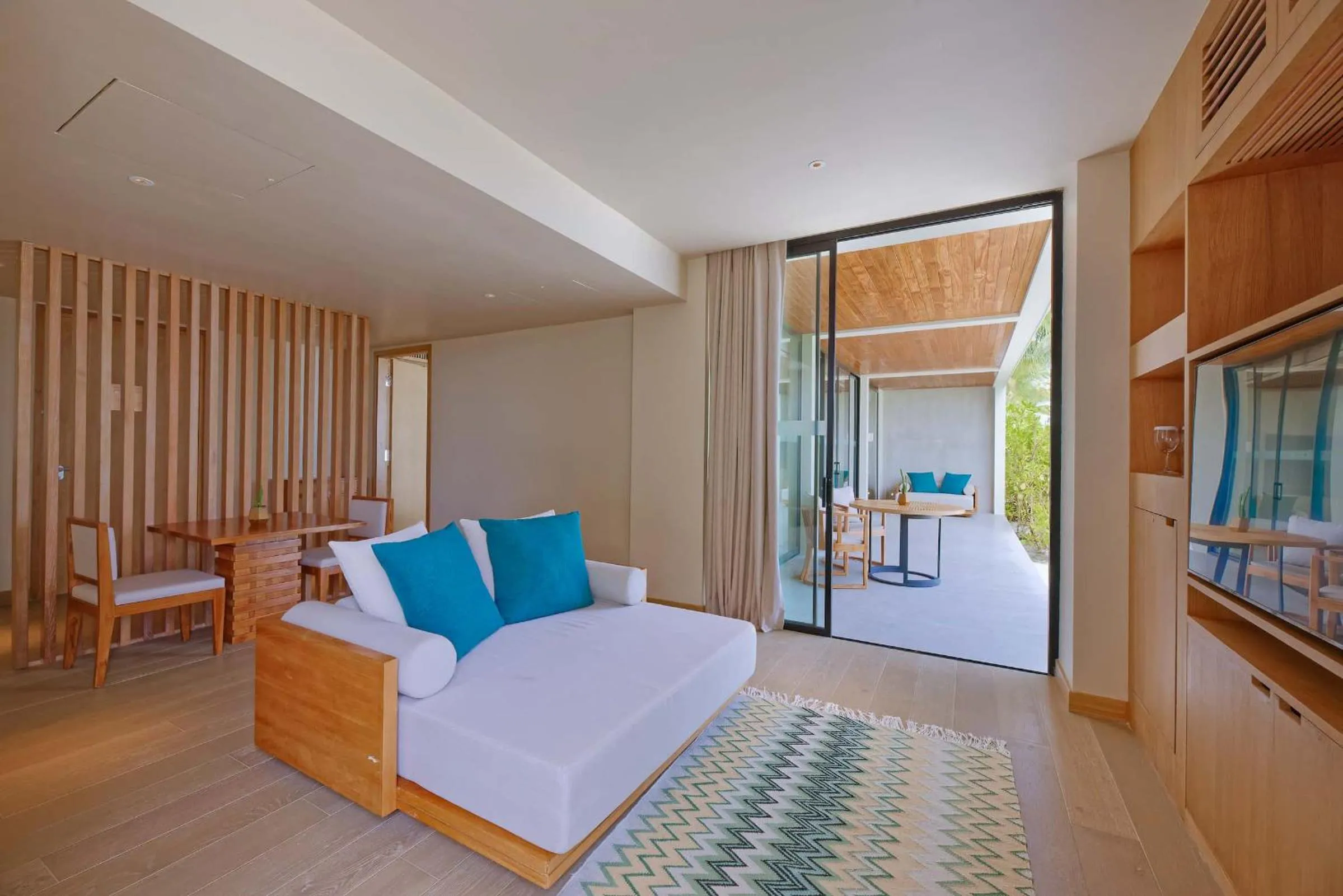 Living room, Bed in Kuda Villingili Maldives, Free Return Transfers 03 nights & above