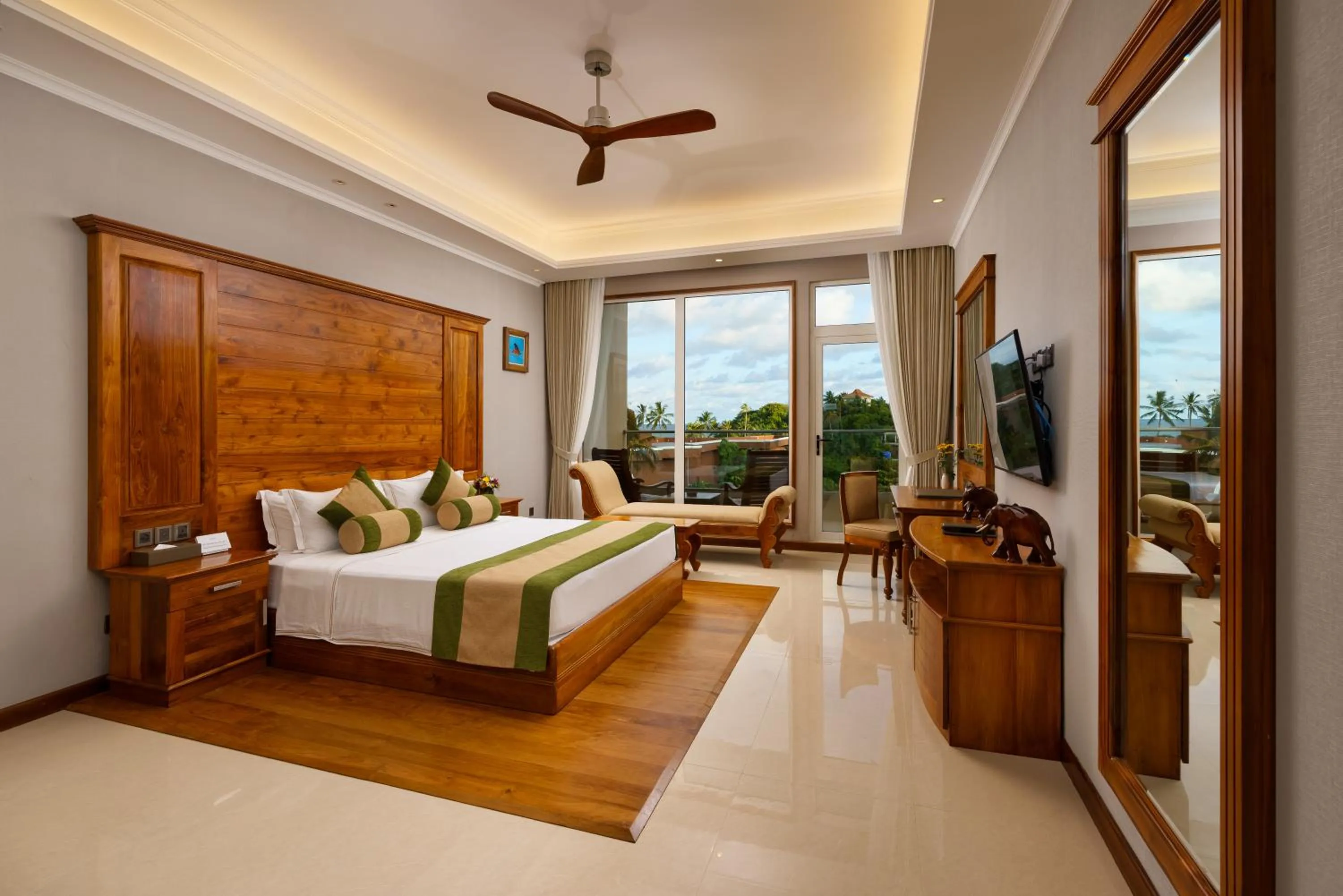 Photo of the whole room, Bed in Araliya Beach Resort & Spa Unawatuna- Where you meet the sea all year