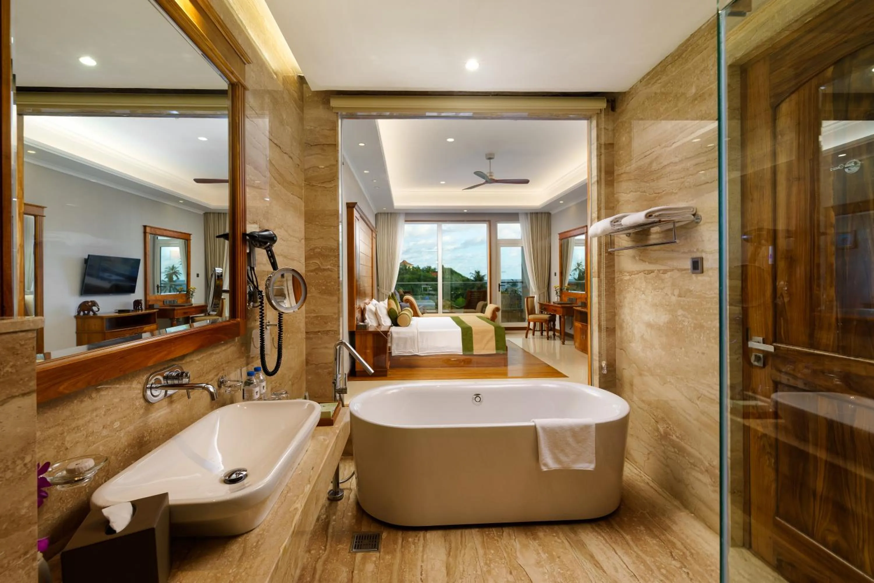 Bathroom, Bed in Araliya Beach Resort & Spa Unawatuna- Where you meet the sea all year
