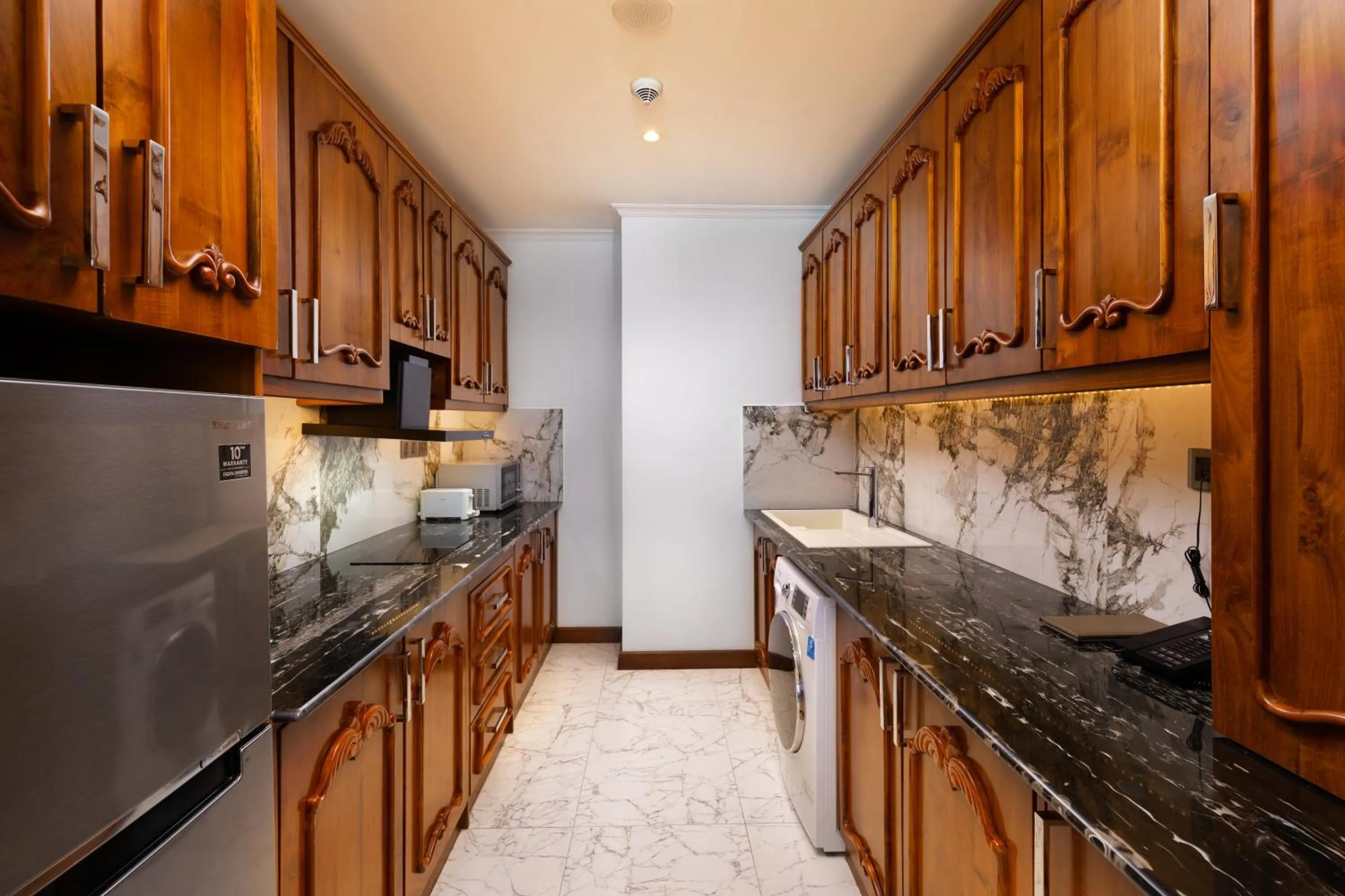 Kitchen or kitchenette in Araliya Beach Resort & Spa Unawatuna- Where you meet the sea all year