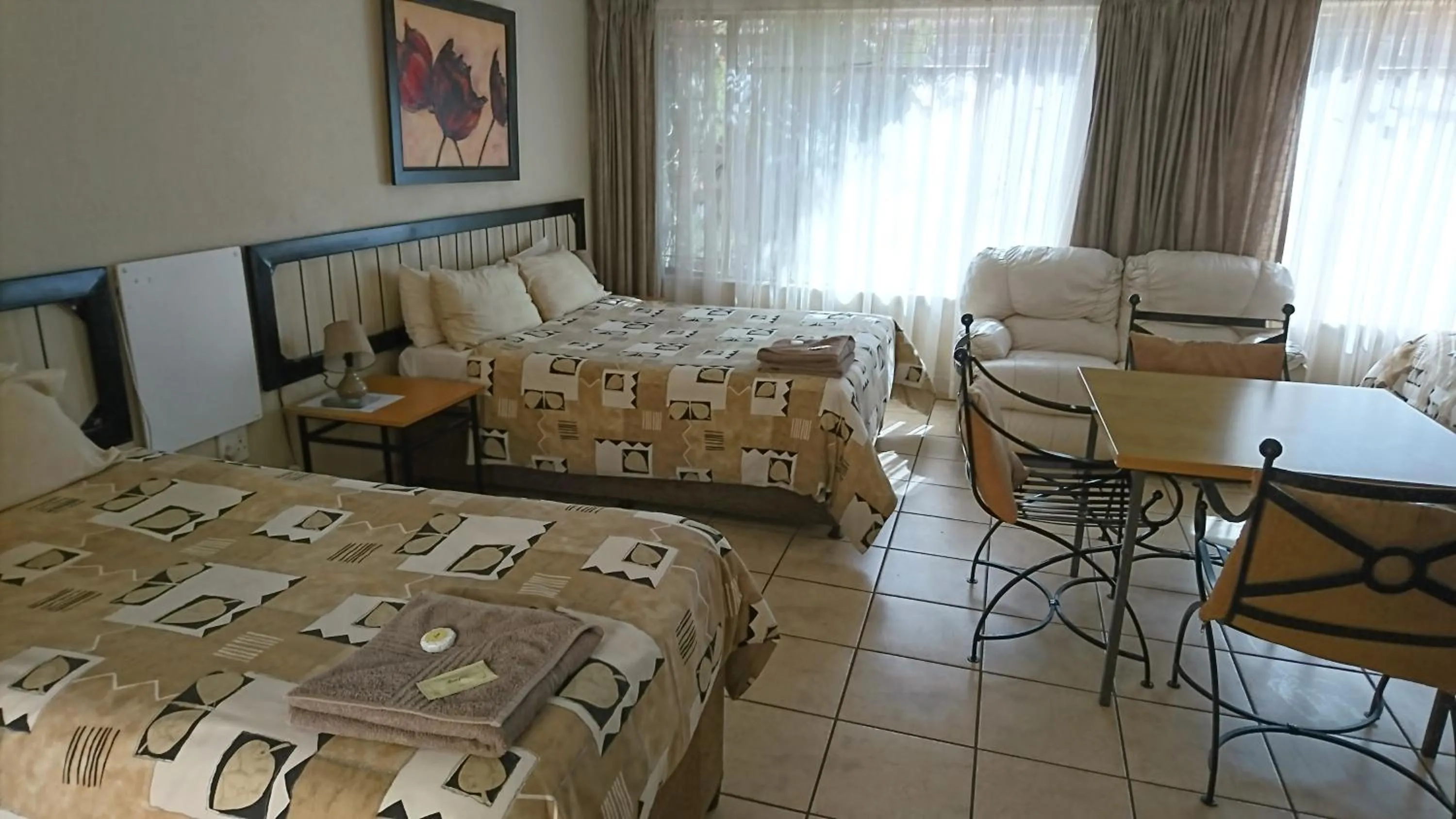 Bed in Country Blue Luxury Guest House