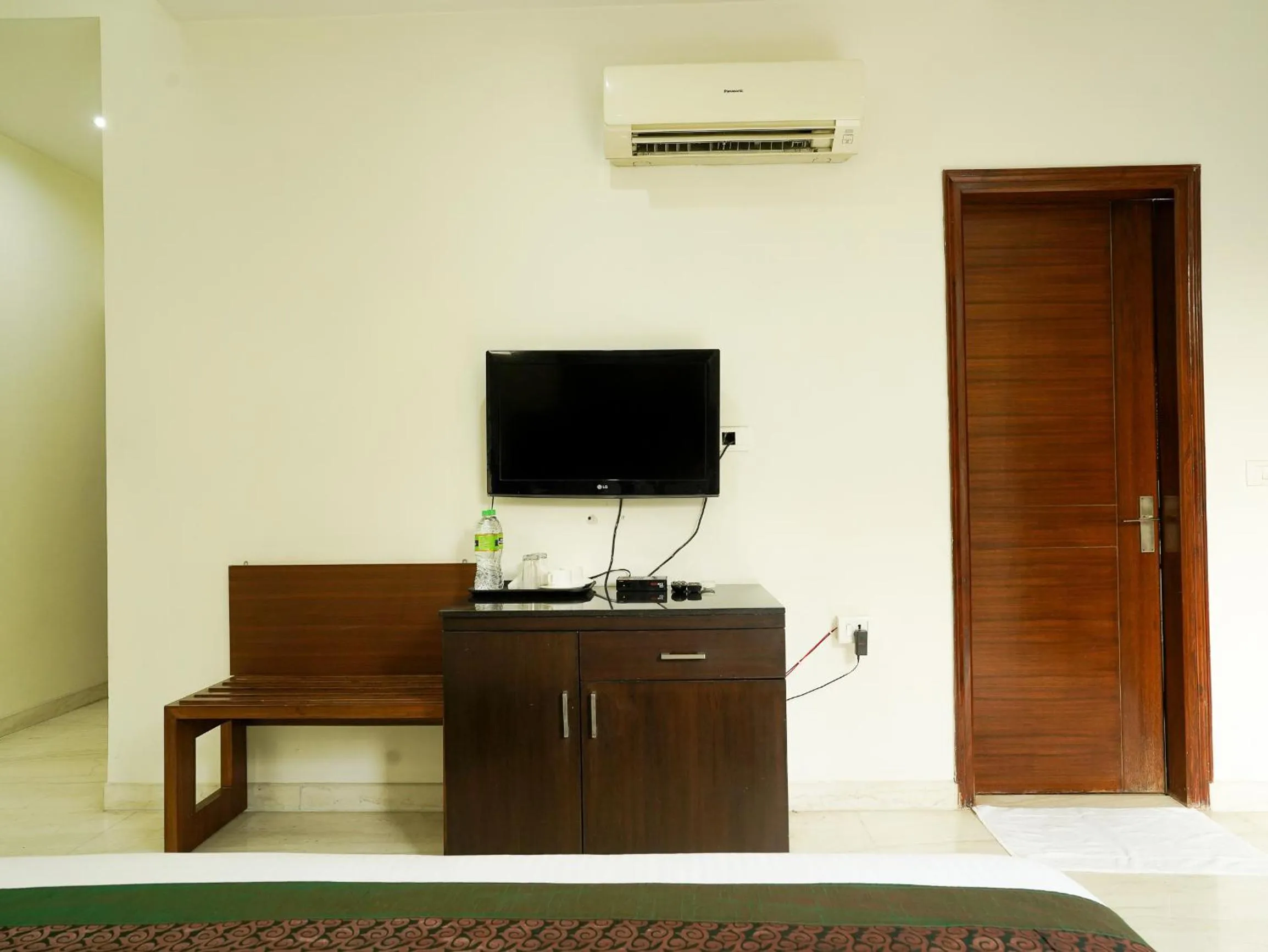 Communal lounge/ TV room in Lime Tree Hotel Sushant Lok Gurgaon Sector 29 Next to IFFCO CHOWK metro