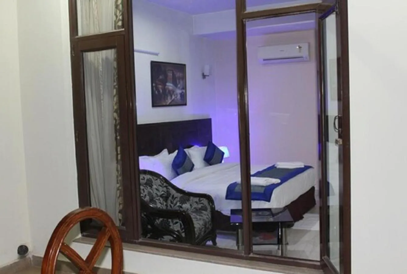 View (from property/room), Bed in Lime Tree Hotel Sushant Lok Gurgaon Sector 29 Next to IFFCO CHOWK metro