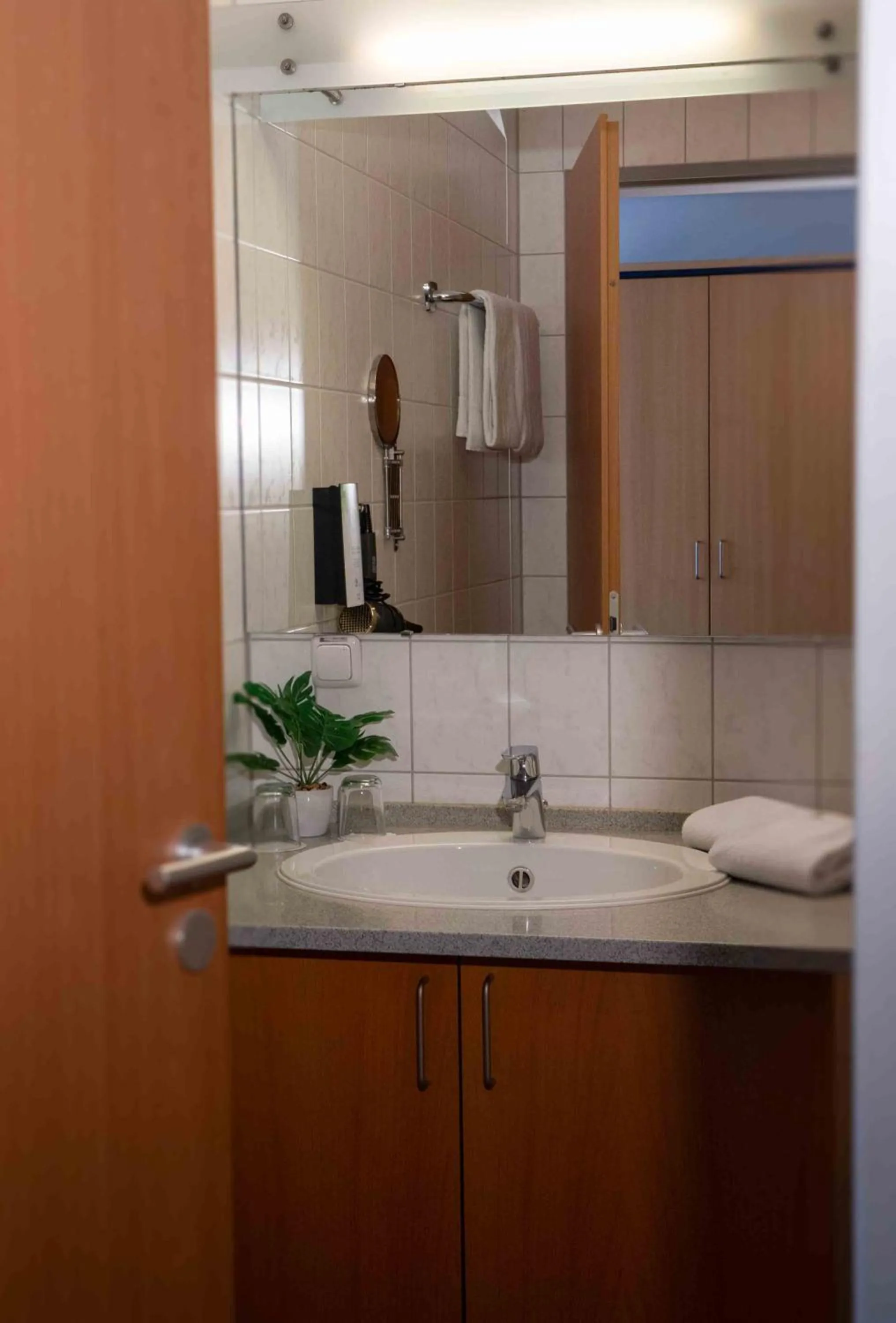 Bathroom in Plaza Inn Braunschweig City Nord