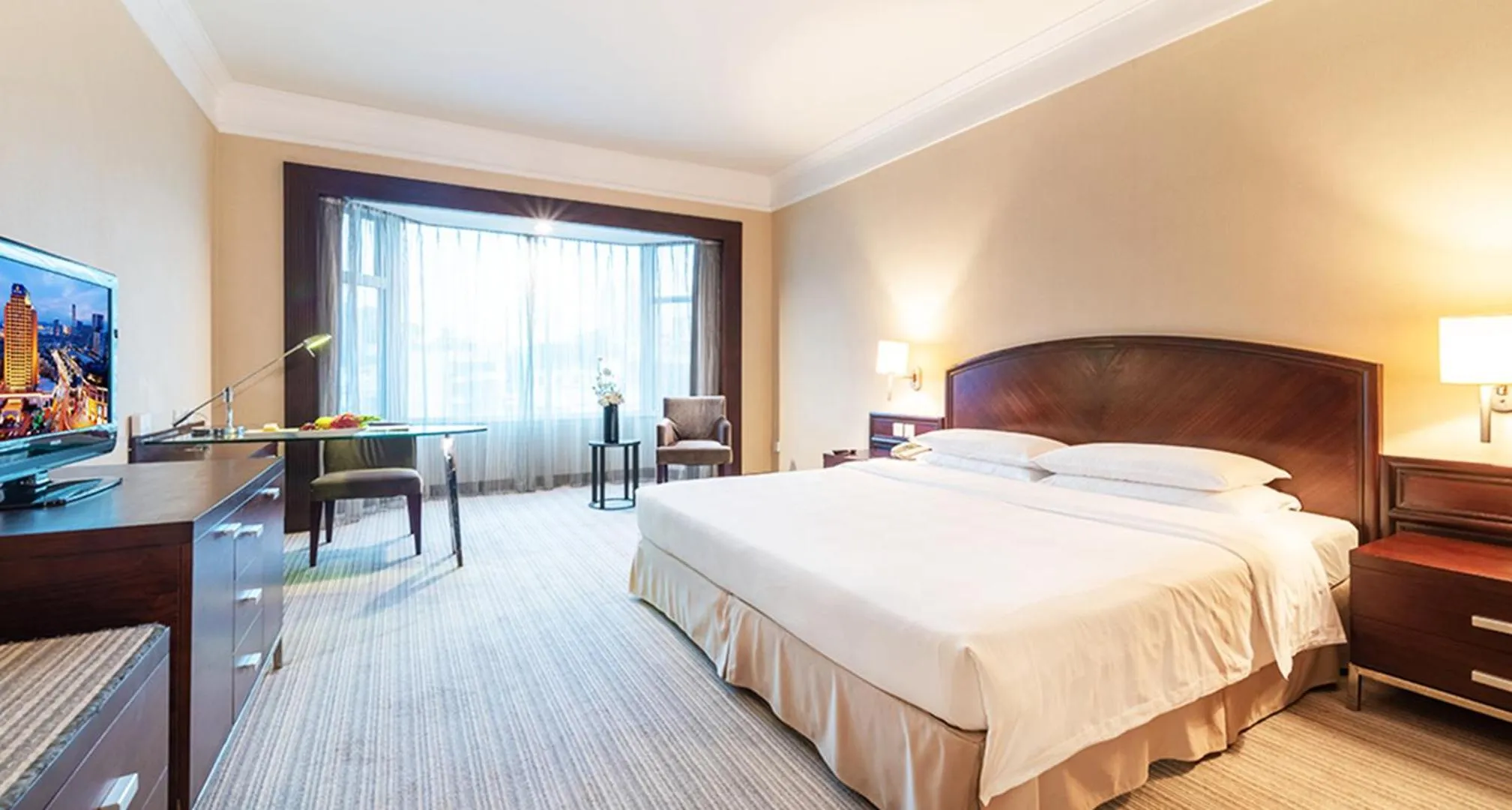 Photo of the whole room, Bed in Millennium Harbourview Hotel Xiamen