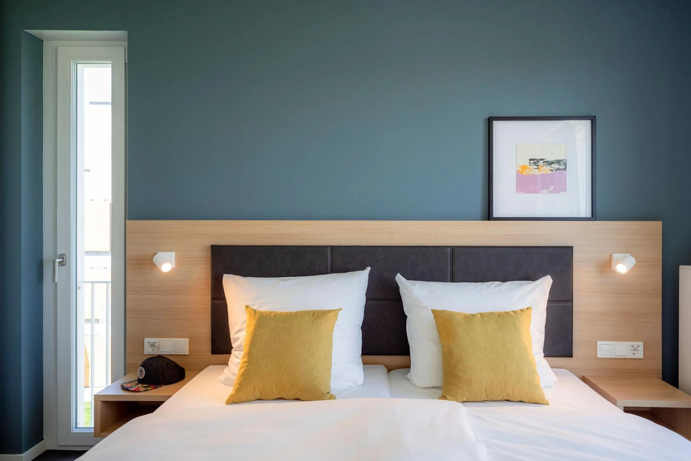 Bed in KONCEPT HOTEL Neue Horizonte