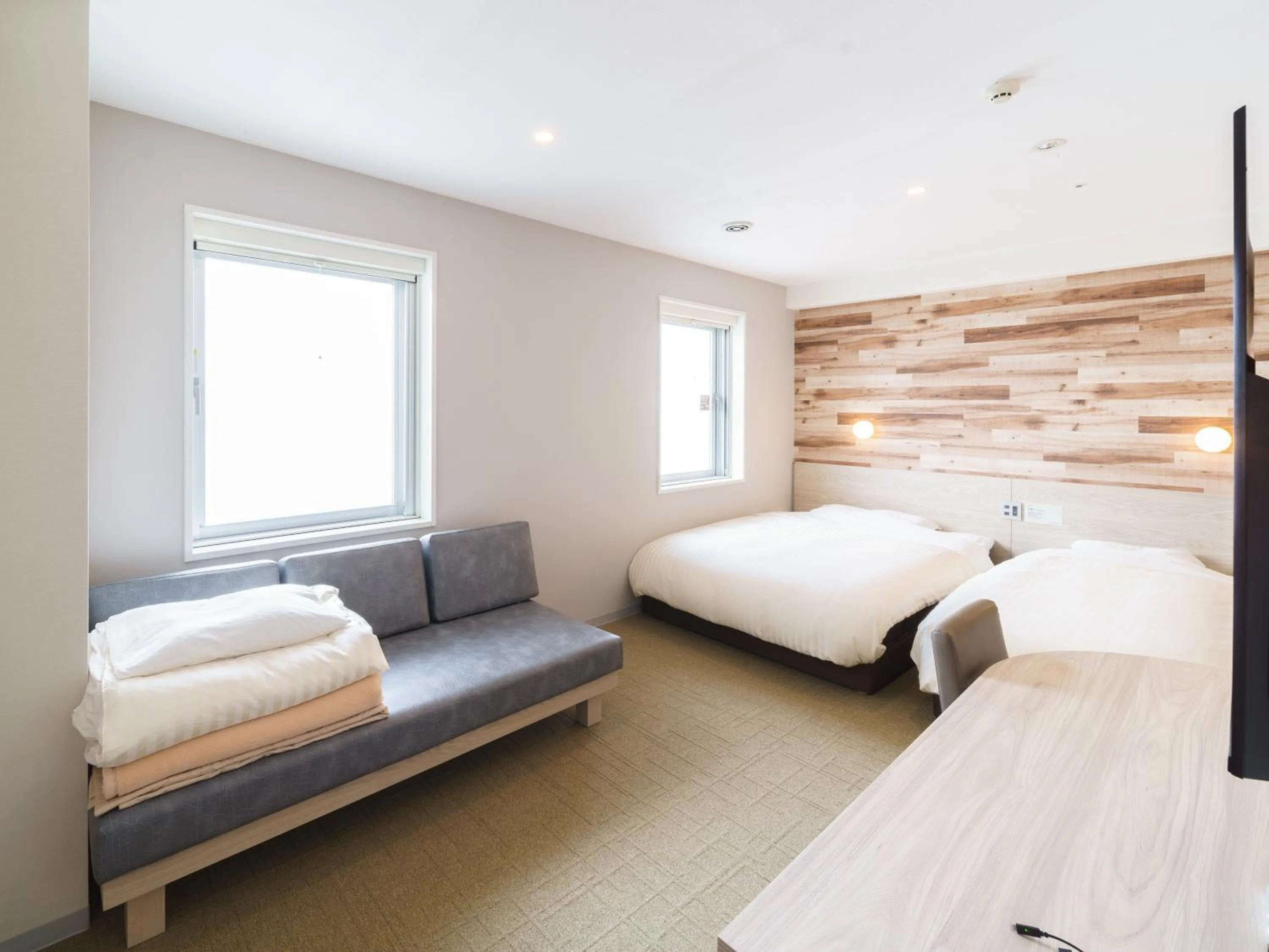 Bed in Super Hotel Kyoto Shijokawaramachi