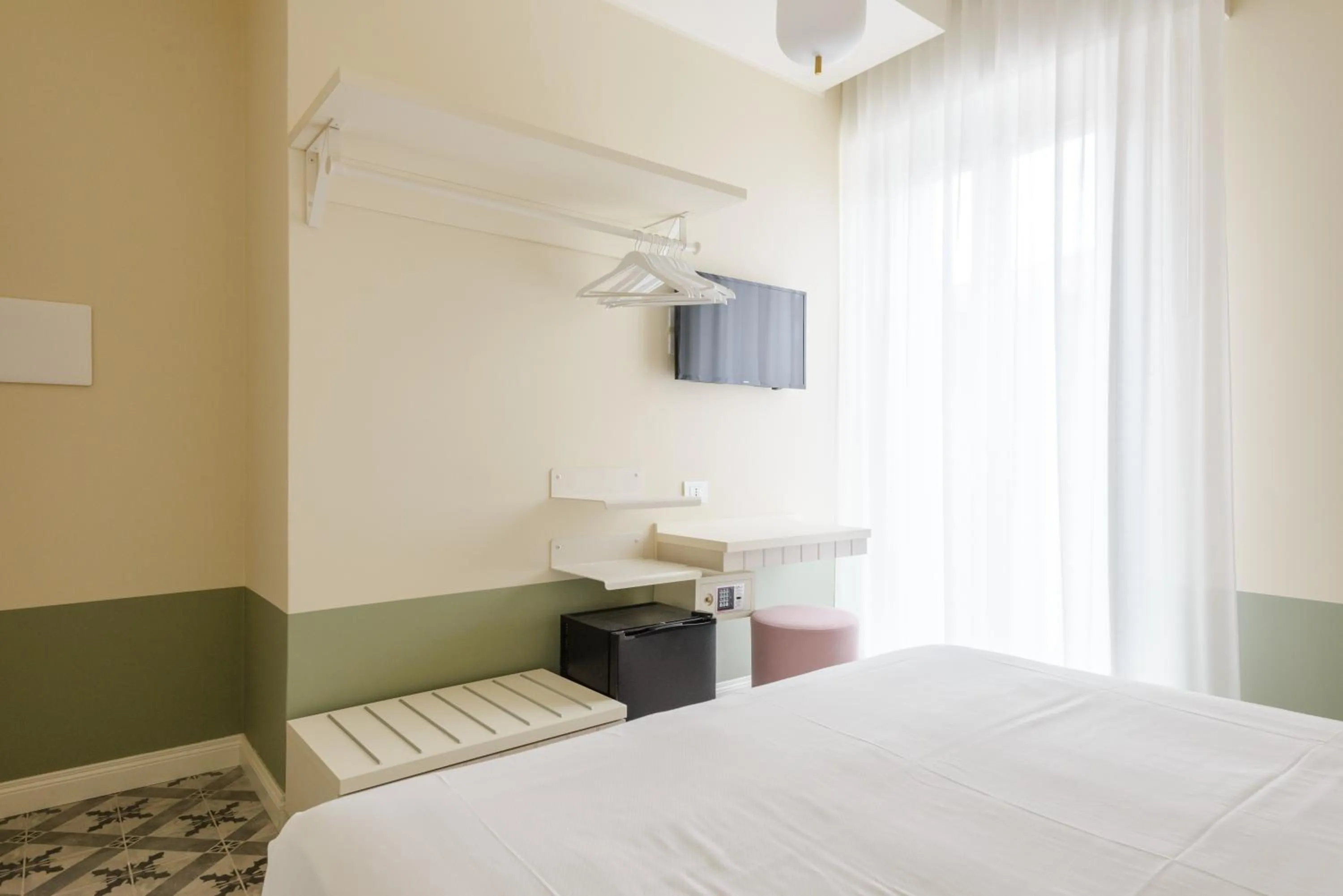 Bed in Pan di Zenzero Icecream Hotel