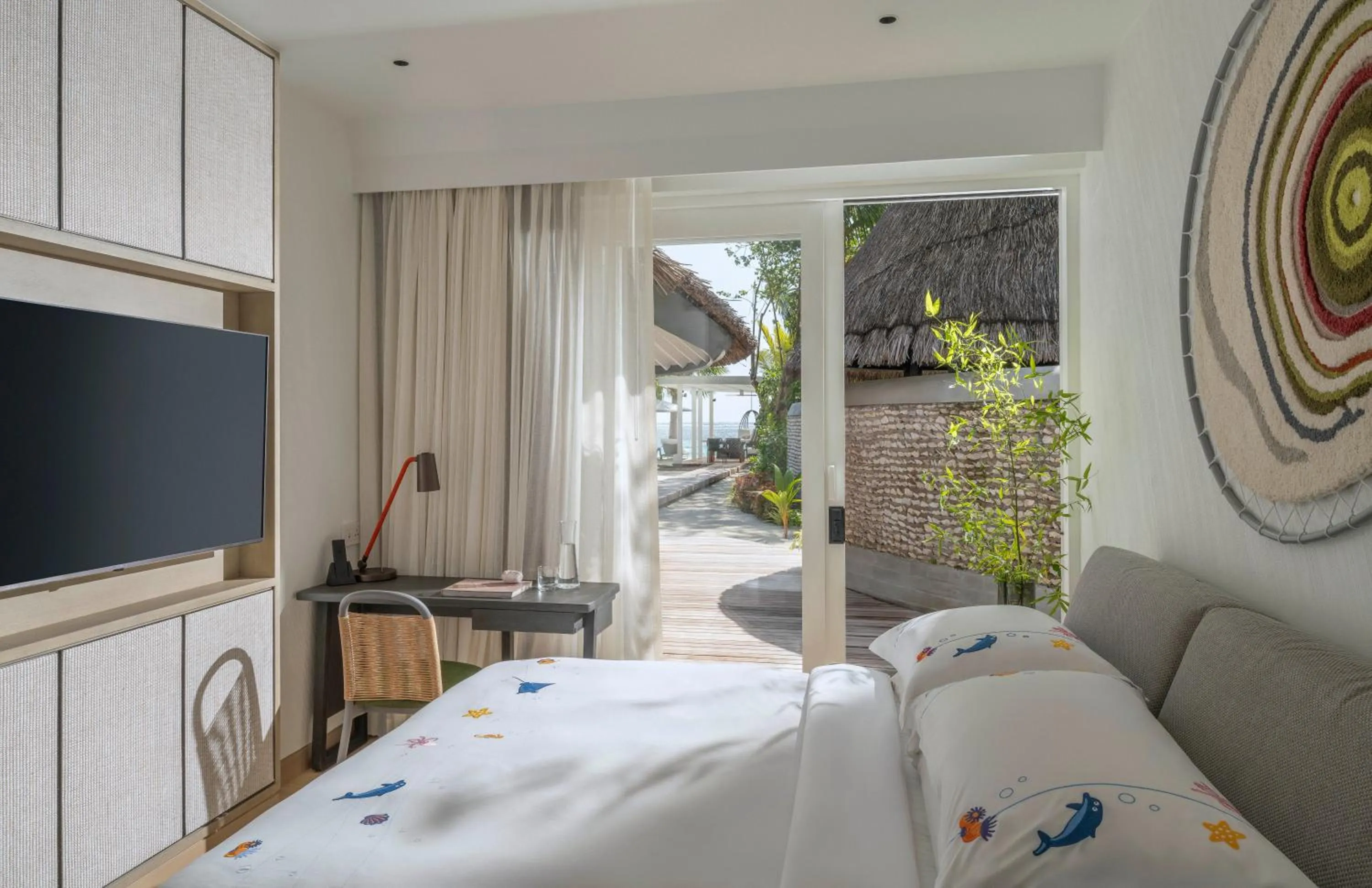 Bedroom, Bed in Four Seasons Resort Maldives at Kuda Huraa