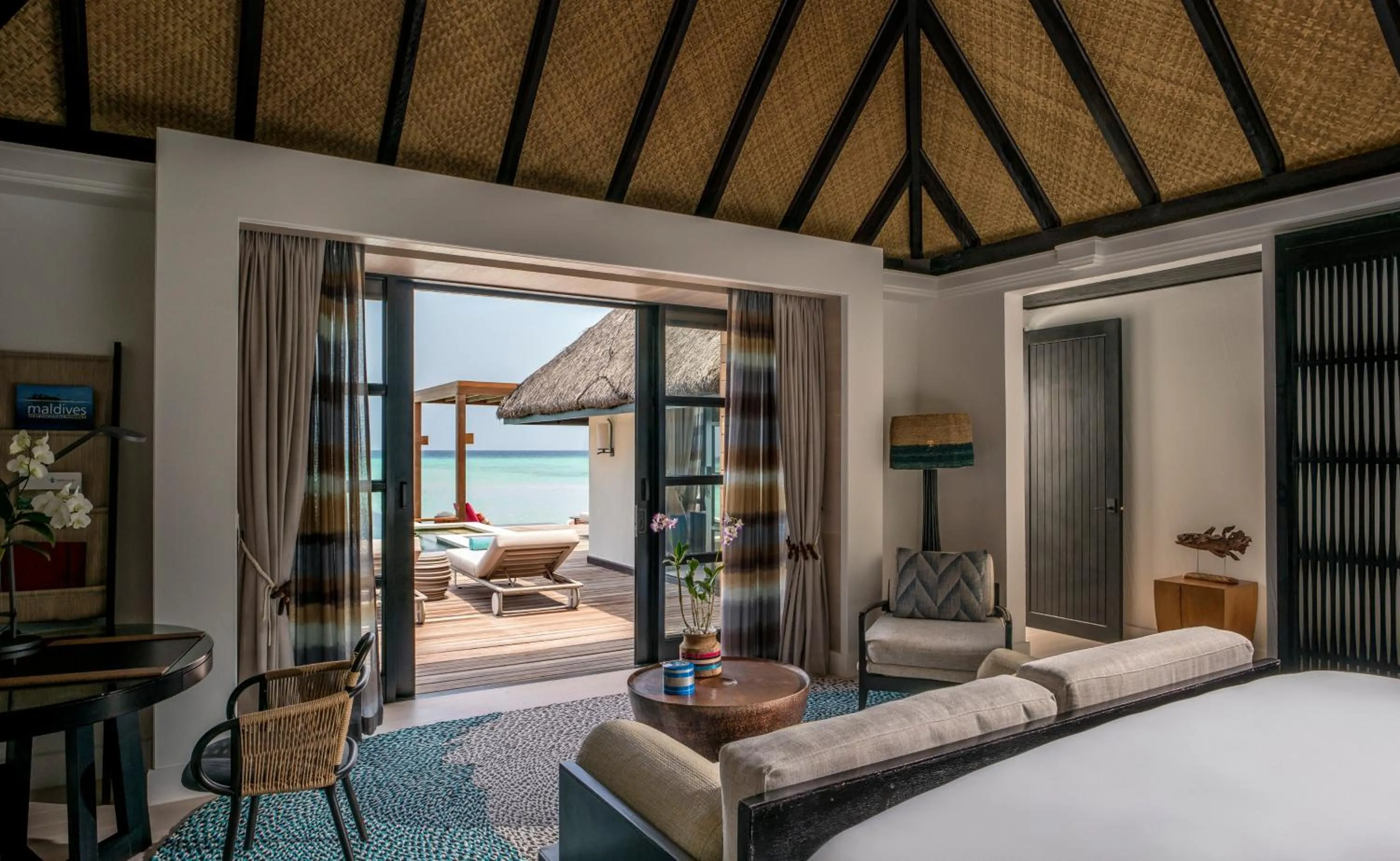 Sea view, Bed in Four Seasons Resort Maldives at Kuda Huraa