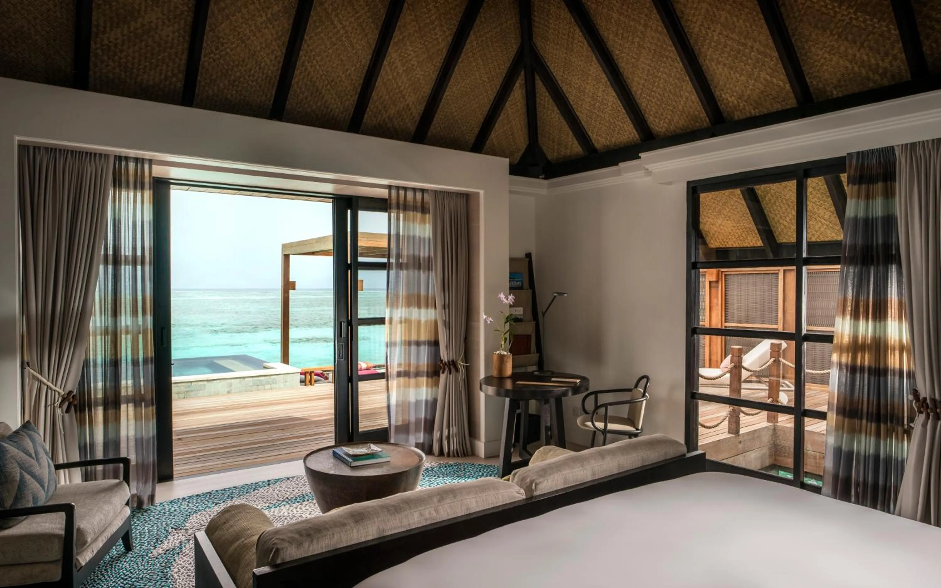 View (from property/room), Bed in Four Seasons Resort Maldives at Kuda Huraa
