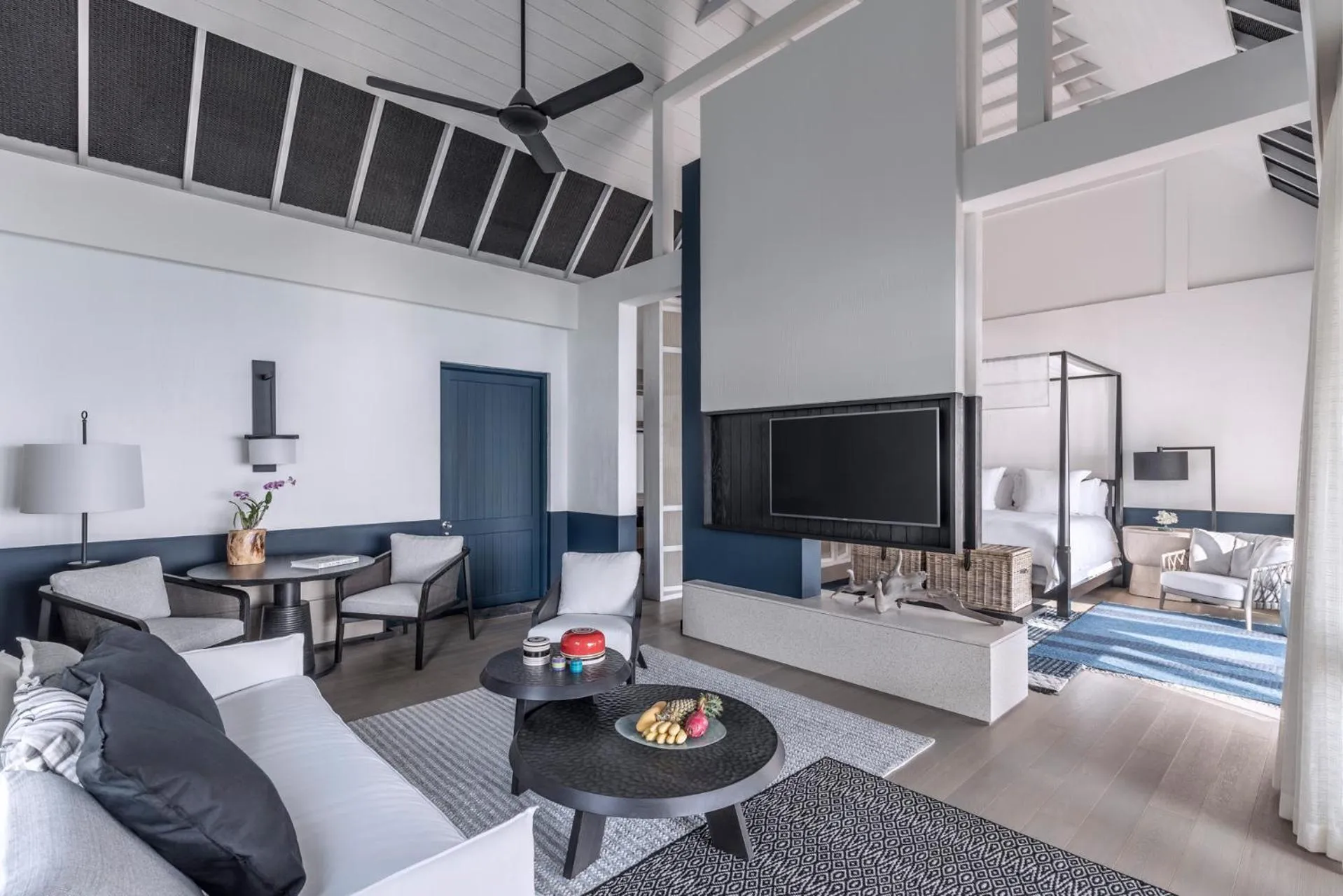 Living room, Bed in Four Seasons Resort Maldives at Landaa Giraavaru