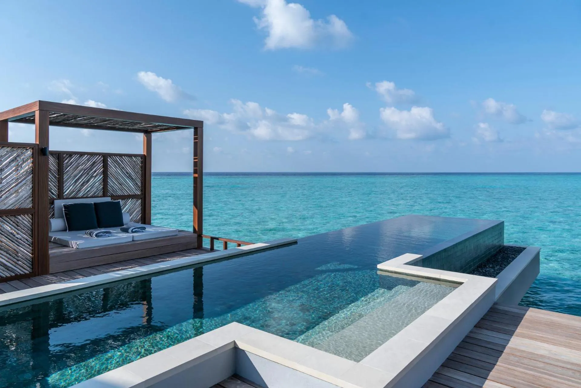 Bed in Four Seasons Resort Maldives at Landaa Giraavaru