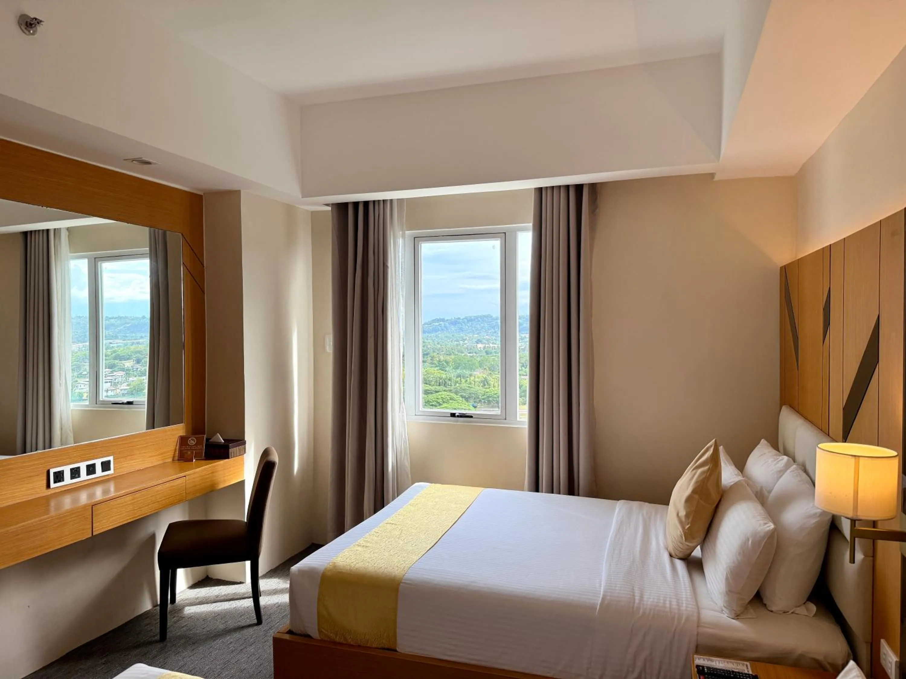 View (from property/room), Bed in Sotogrande Davao Hotel