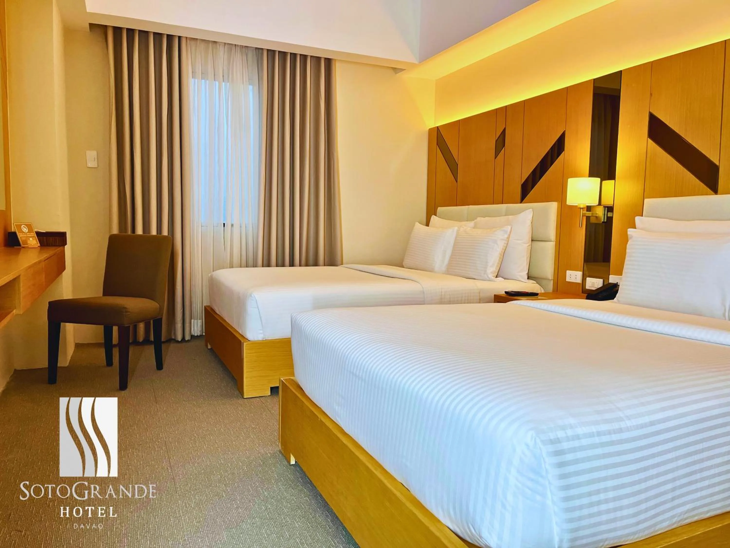 Bed in Sotogrande Davao Hotel