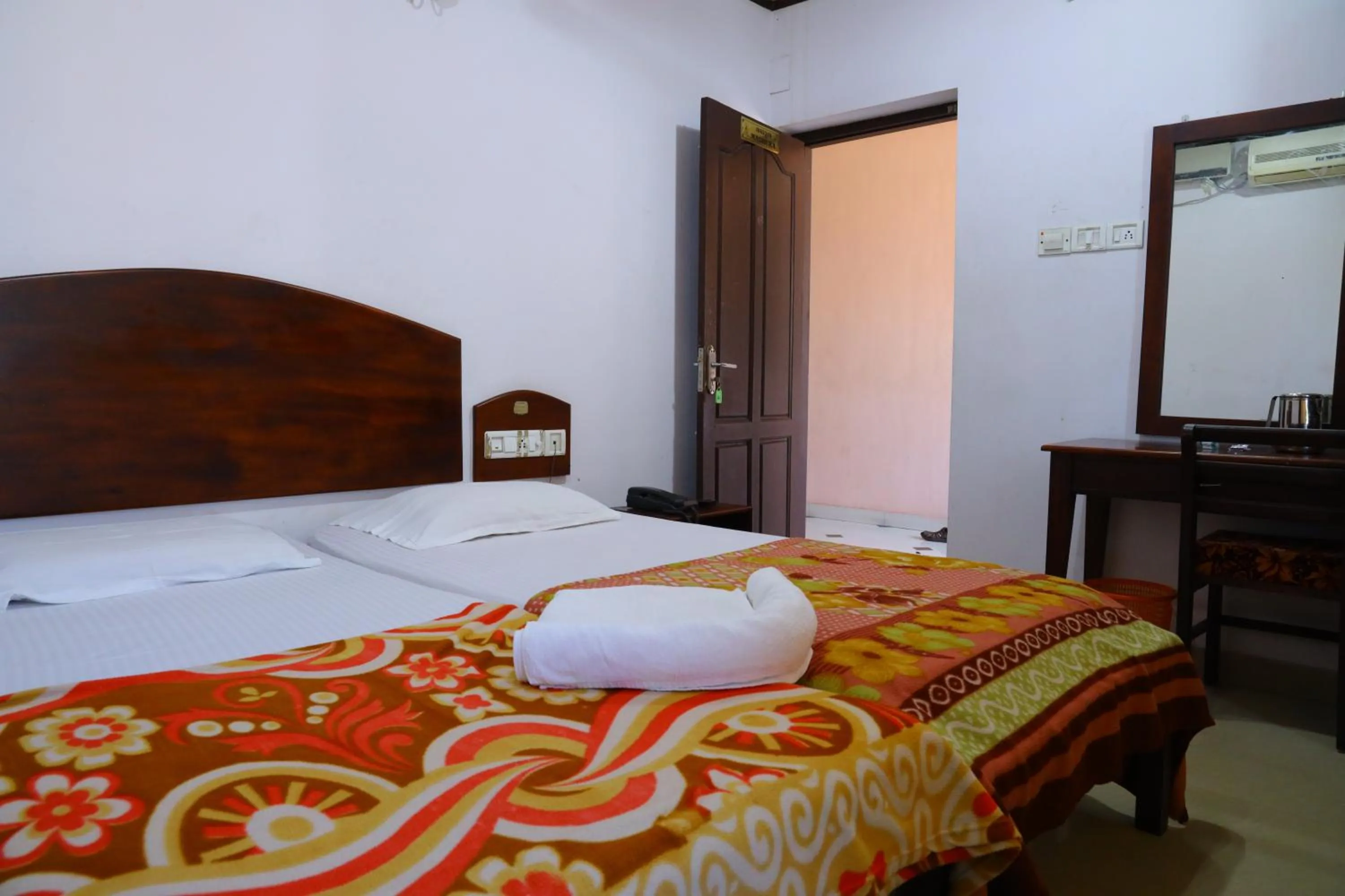 Bedroom, Bed in Ramanilayam Tourist Home
