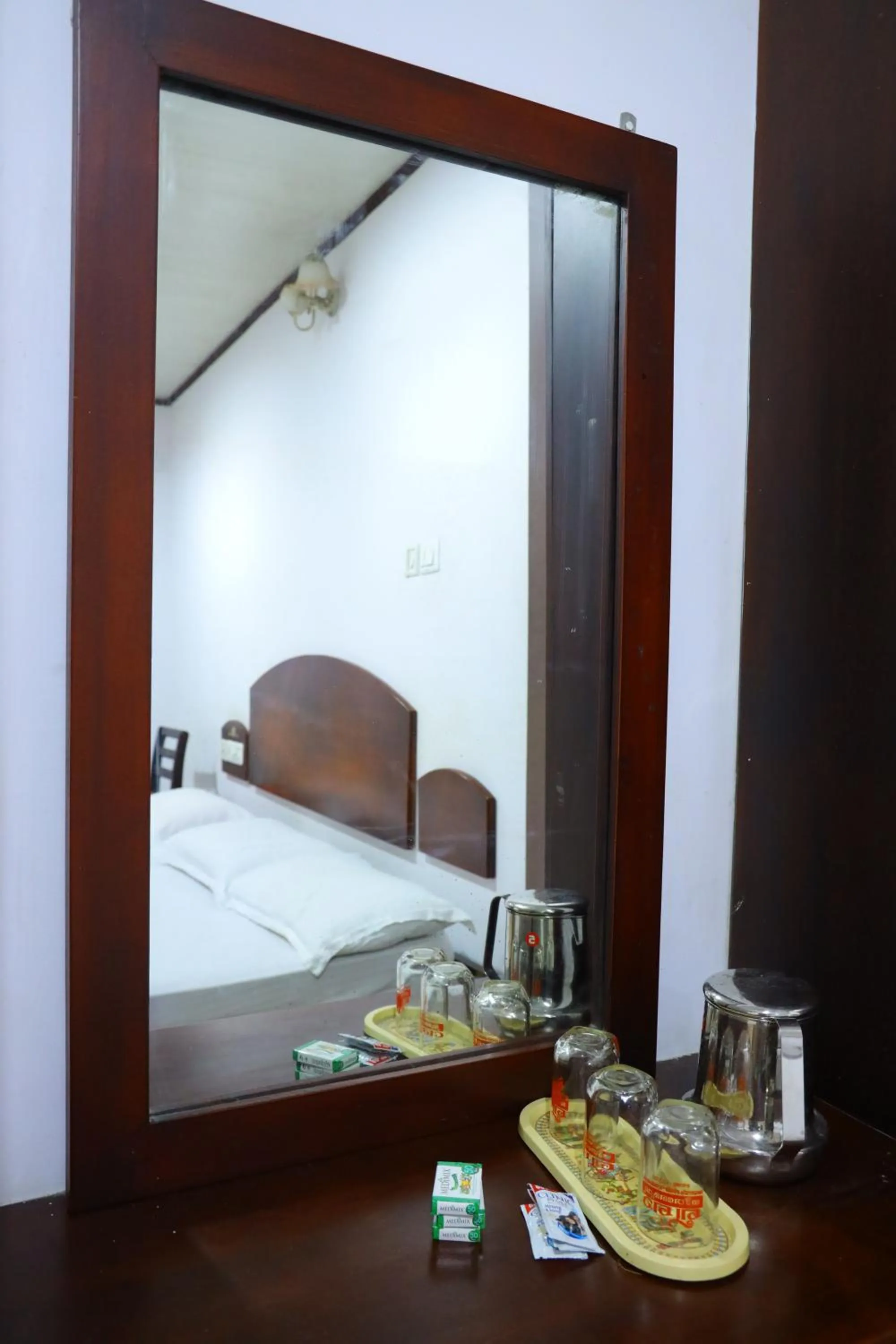 Bathroom, Bed in Ramanilayam Tourist Home