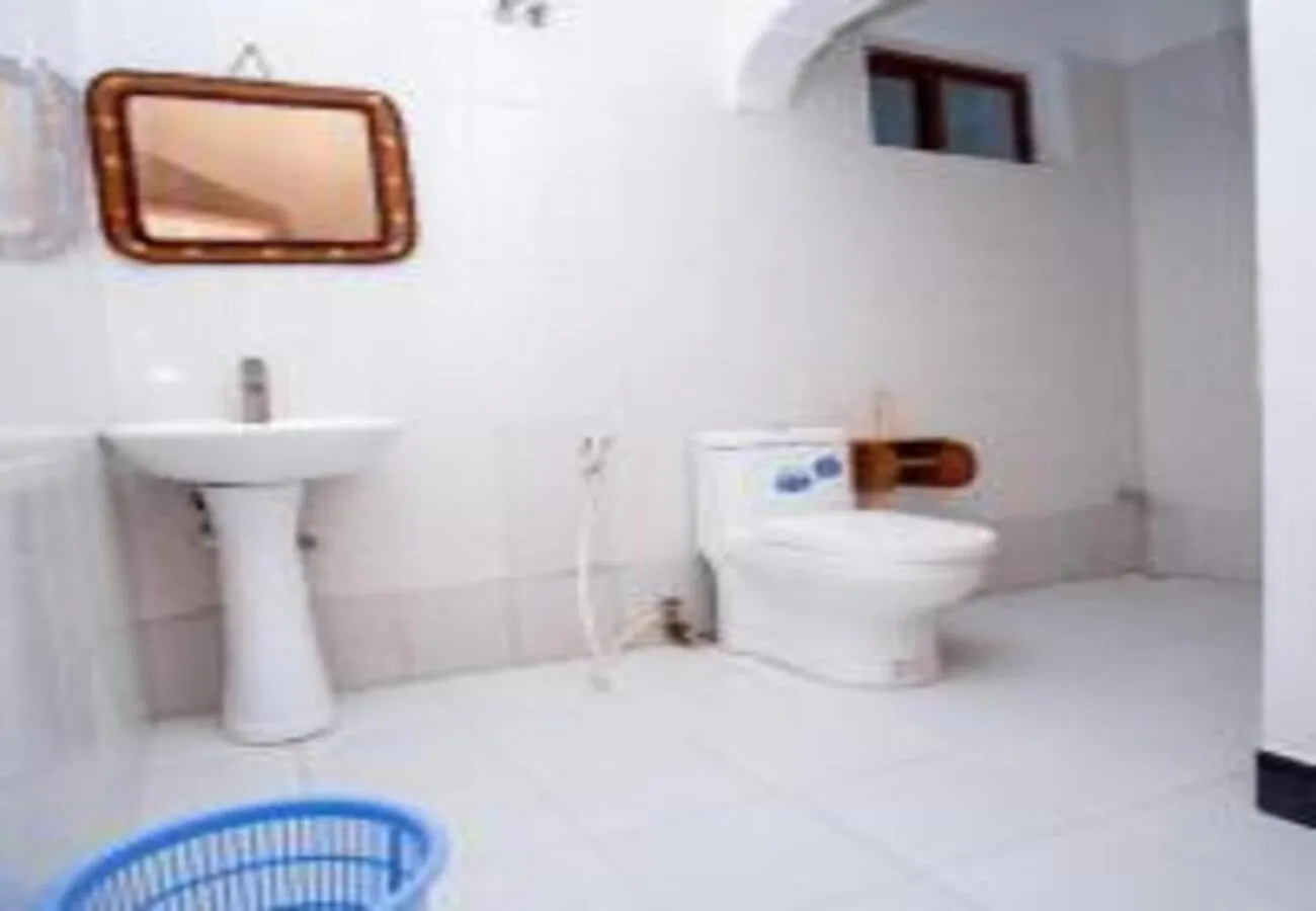 Toilet in Utulivu Bungalow