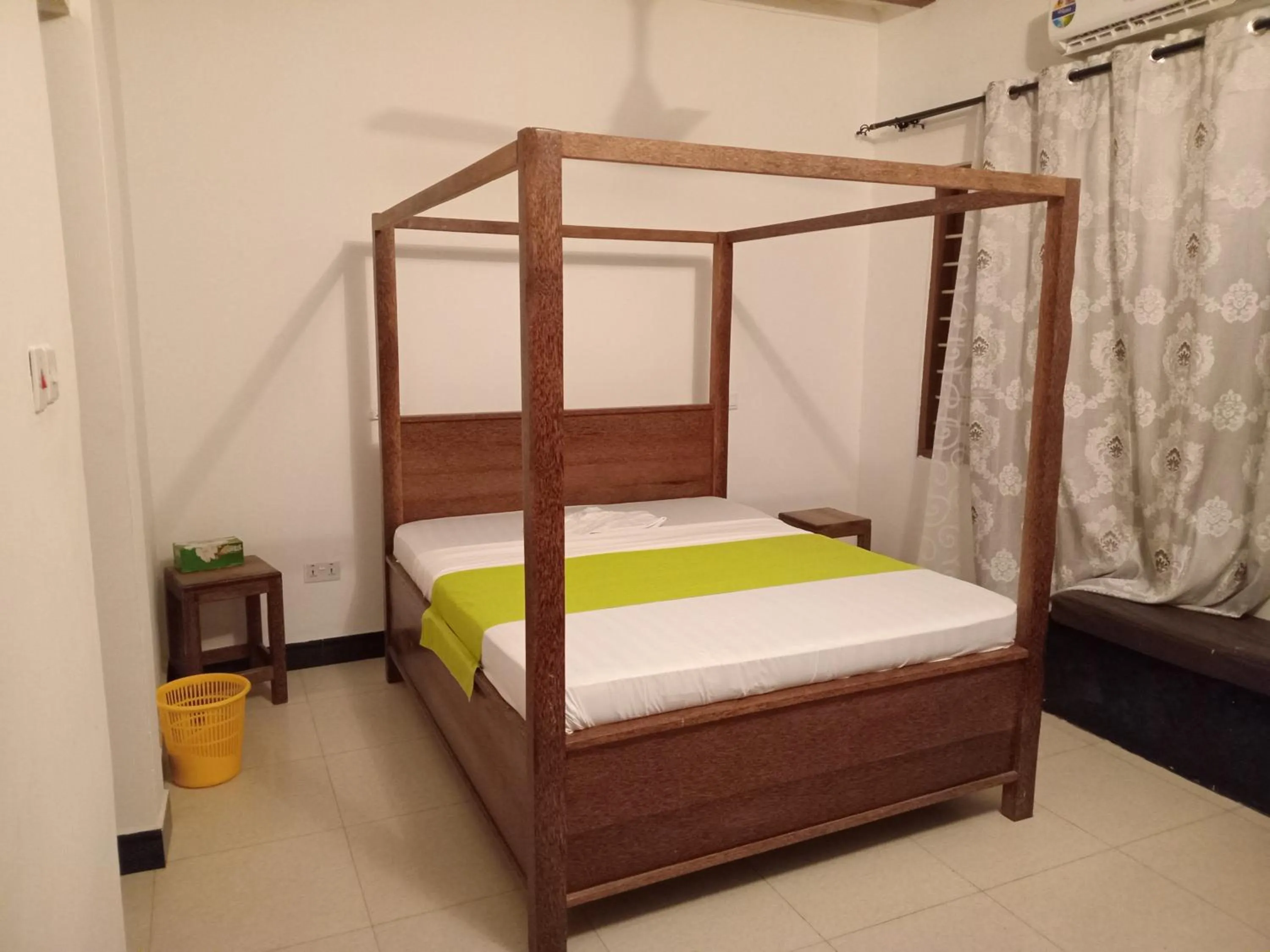 Bed in Utulivu Bungalow