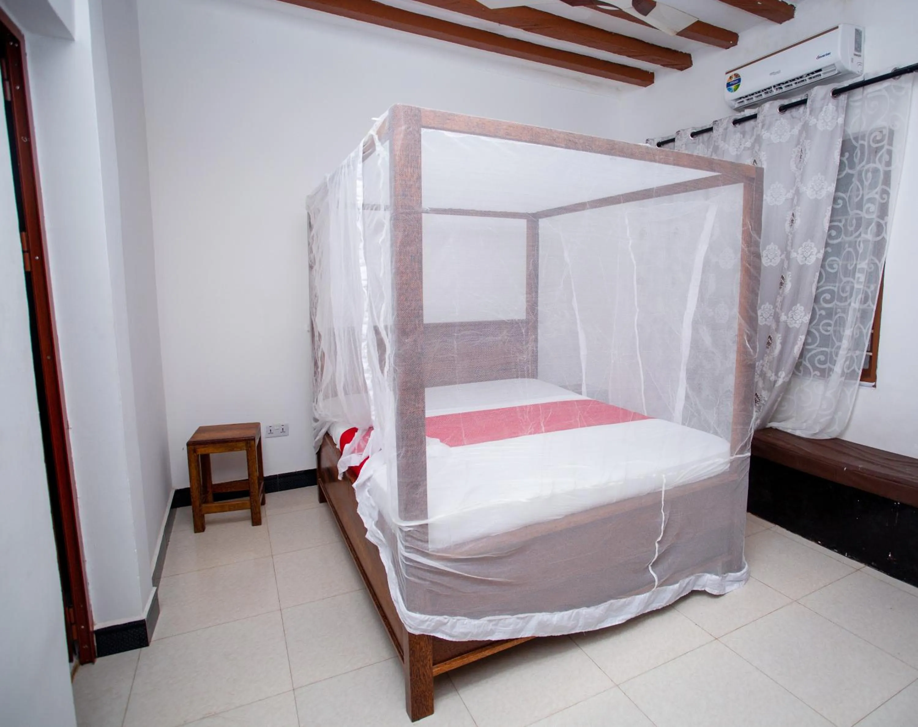 Bed in Utulivu Bungalow